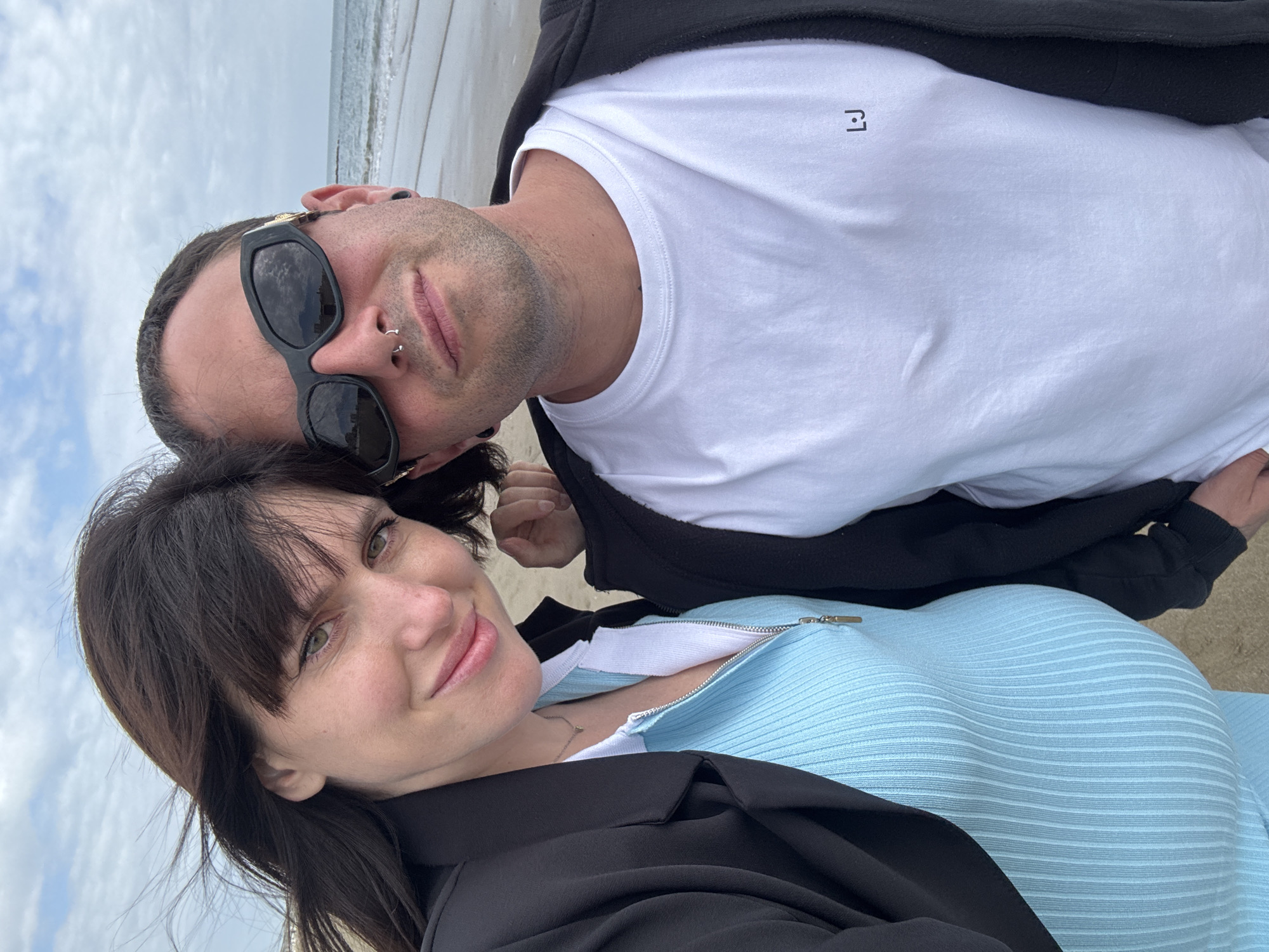 Couple and dog spend afternoon at Nettuno beach