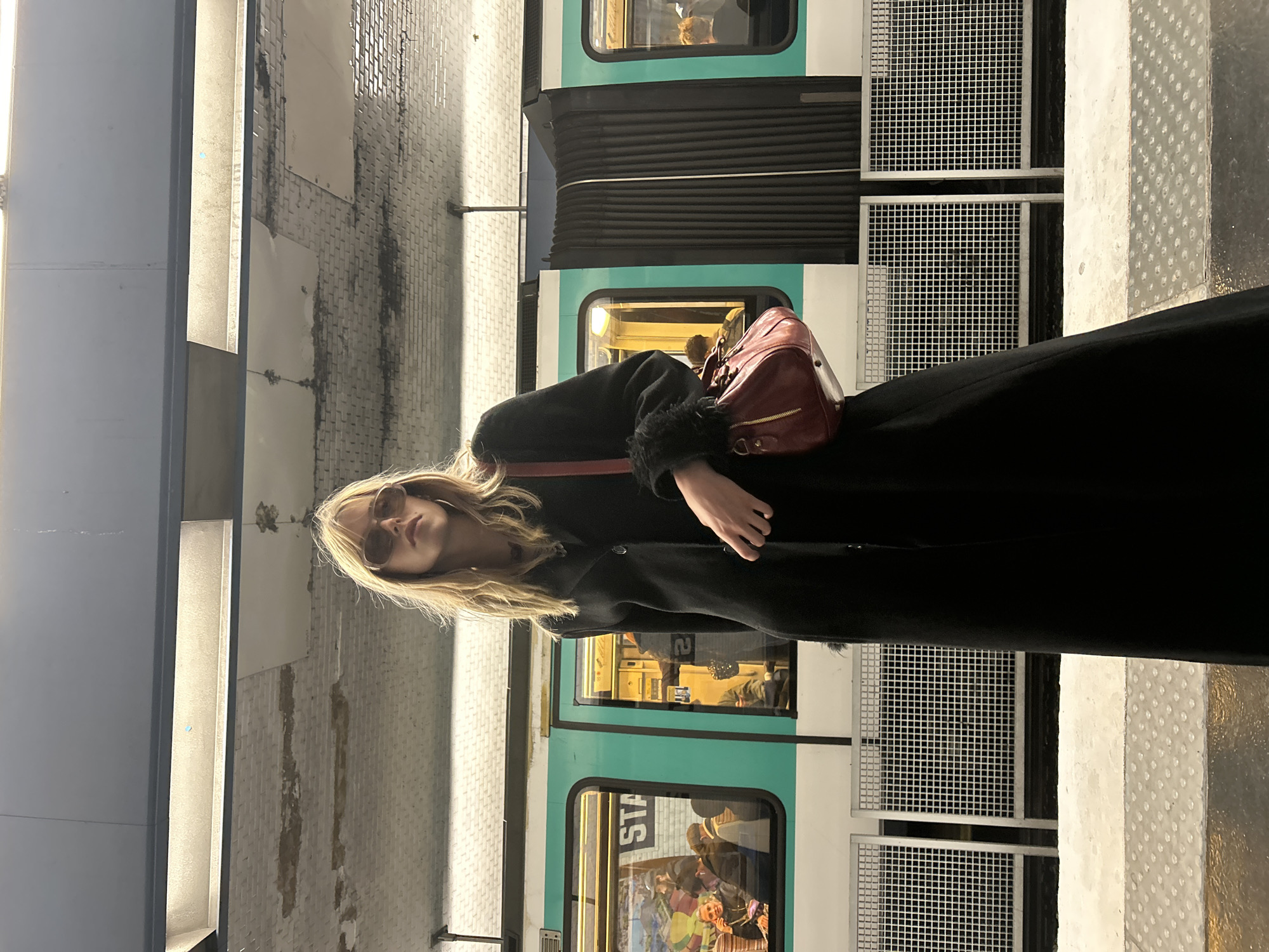 Woman spotted at Paris metro station amid #SundayBest social trend