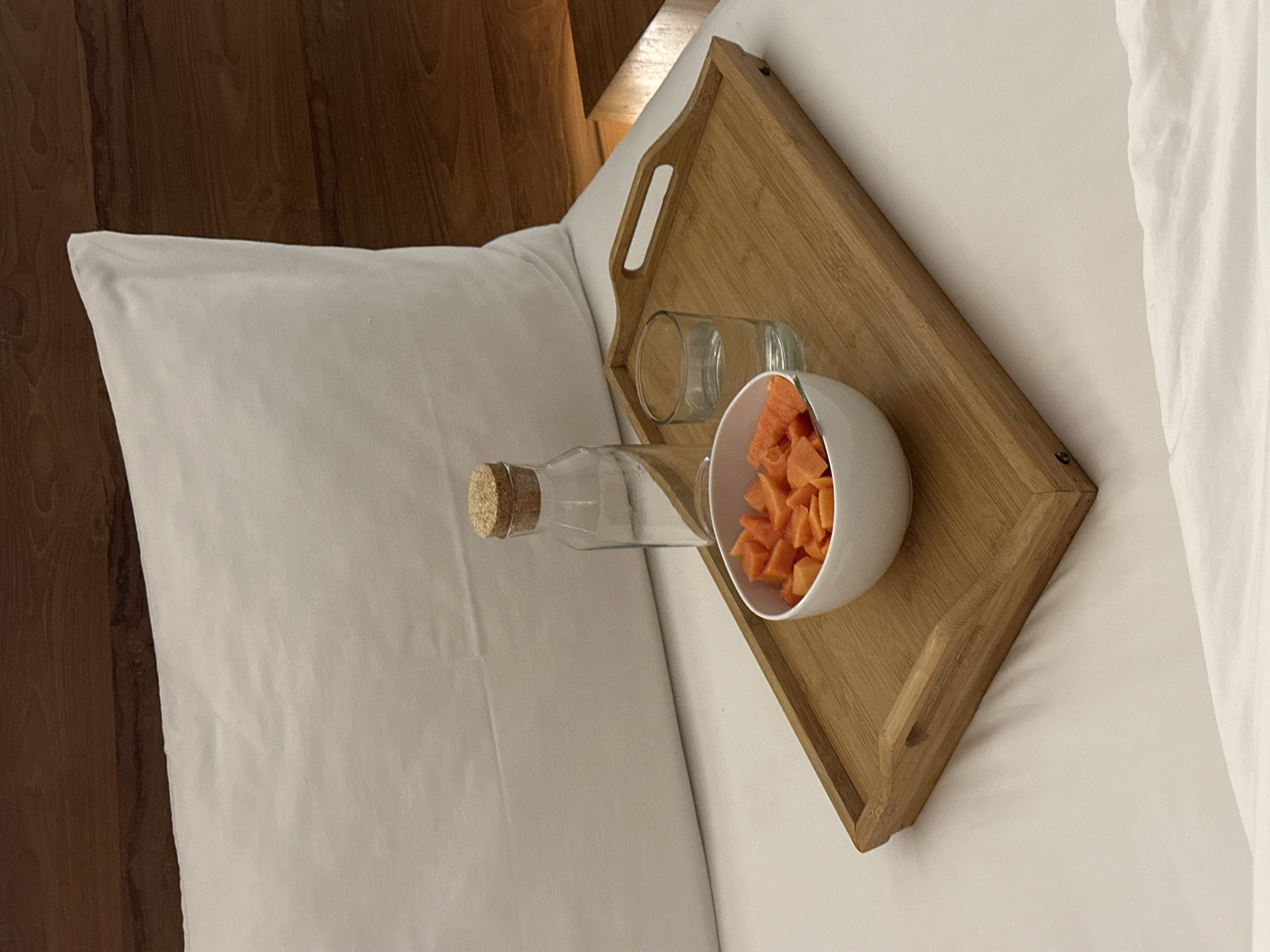 Morning fruit breakfast served in bed in Sukawati