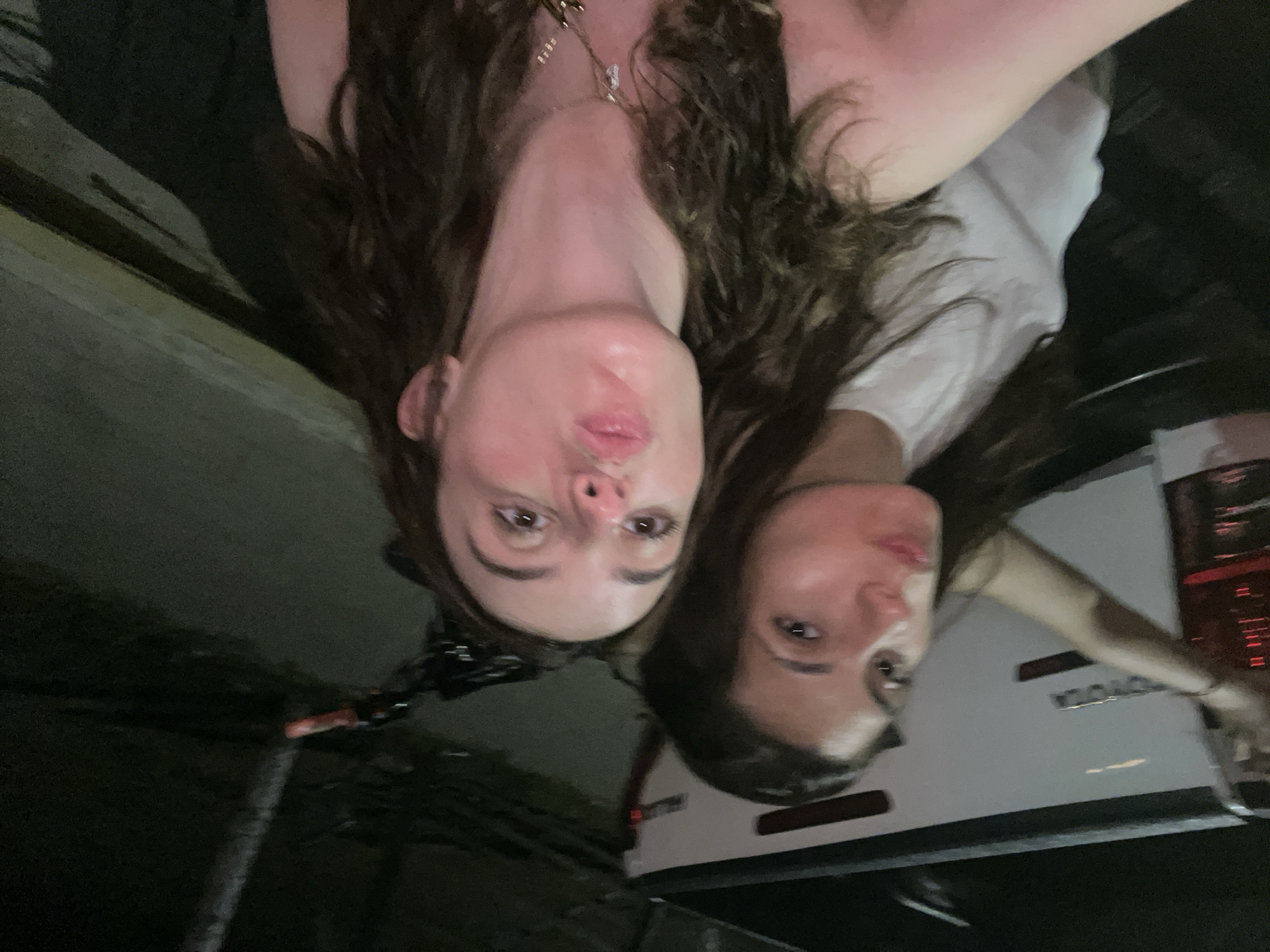 Two women stand by taxi in Brisas de Zicatela