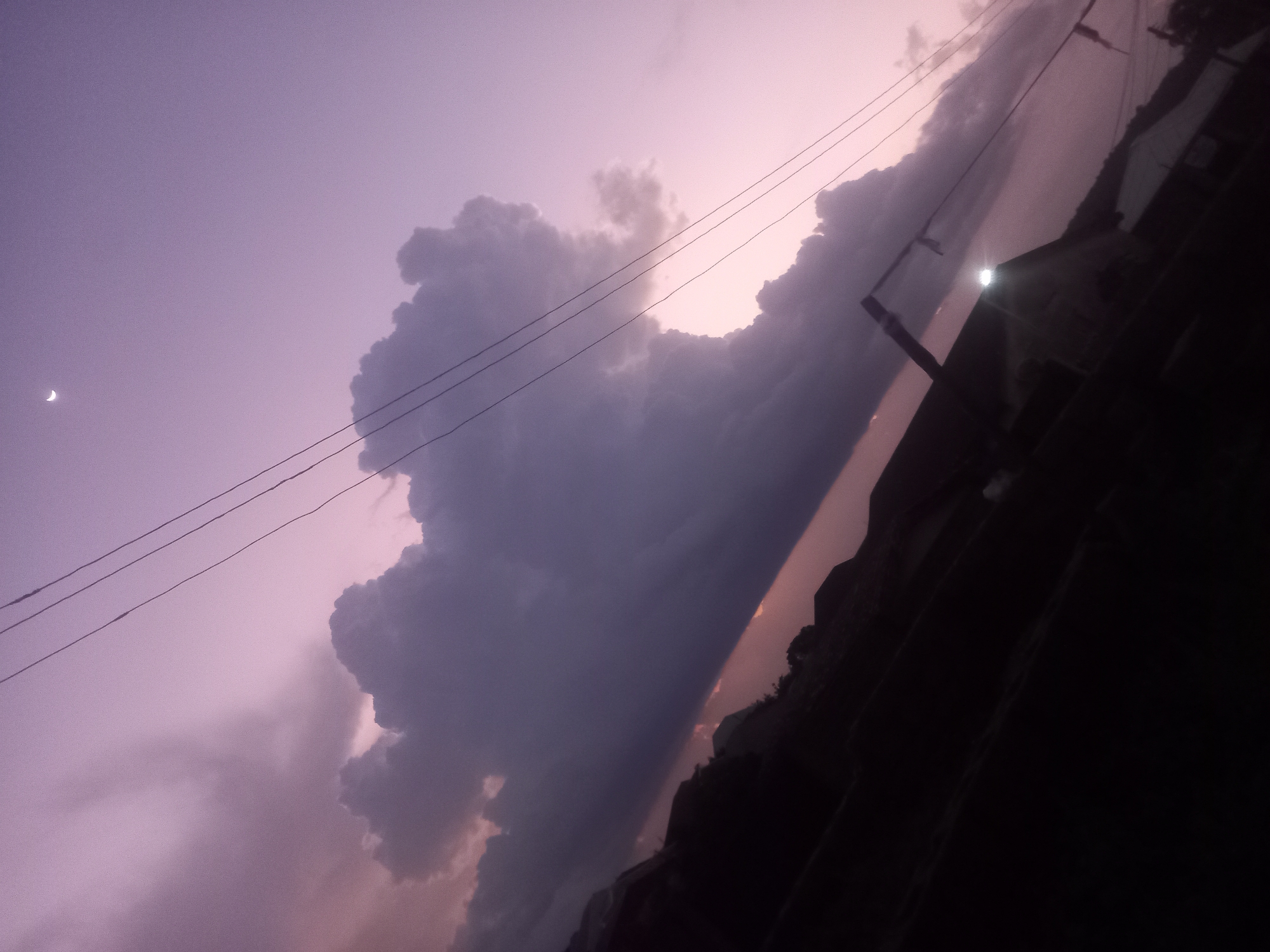 Twilight clouds and fading light, a few minutes apart