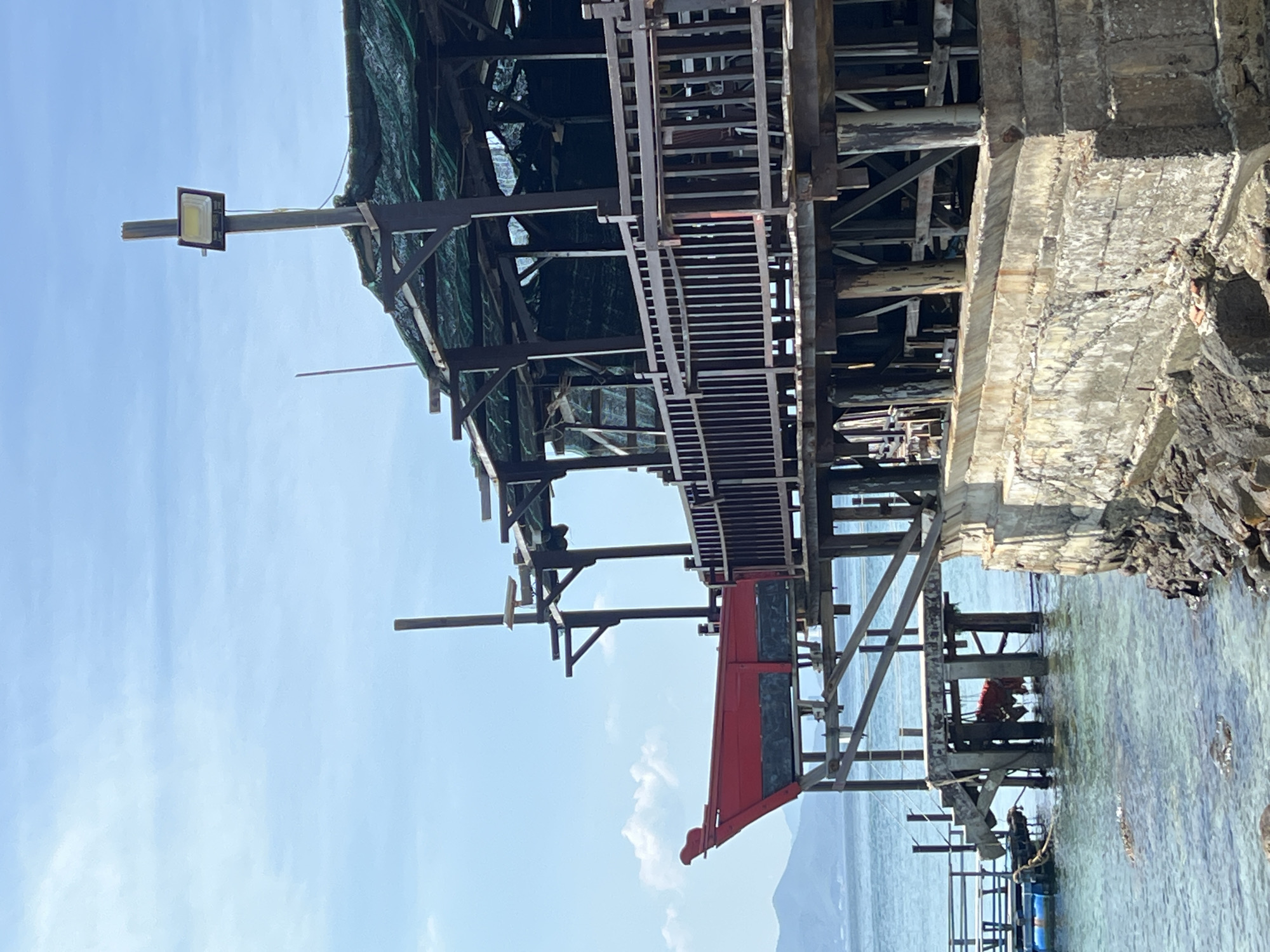 Nha Trang coastline: construction, rocks, and open ocean views