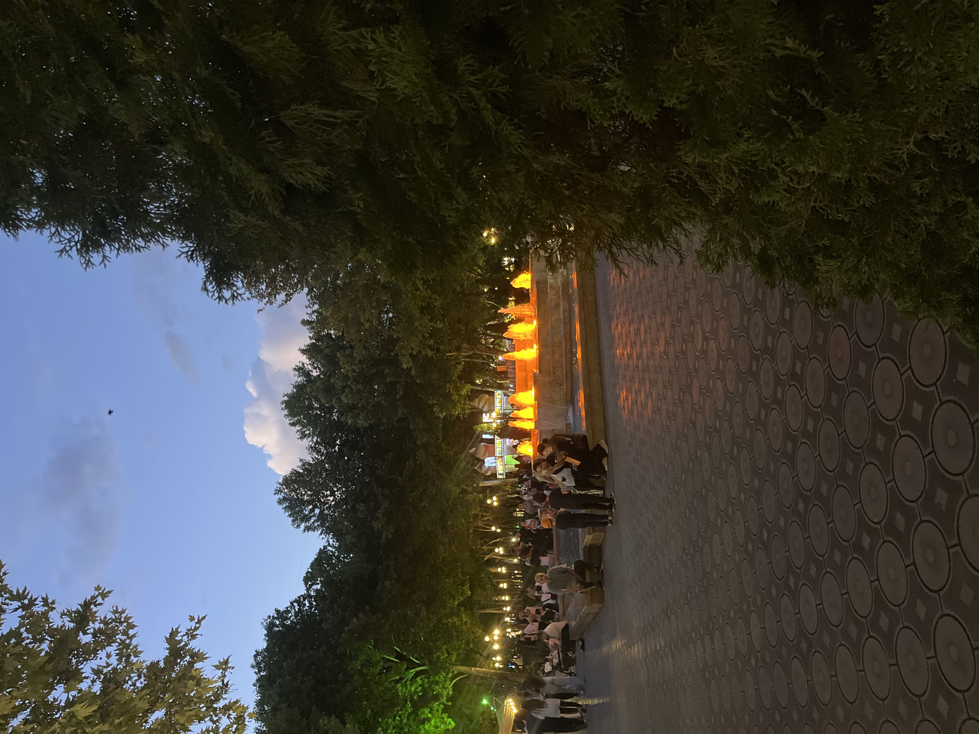 Yerevan's Republic Square fountain lit up at dusk