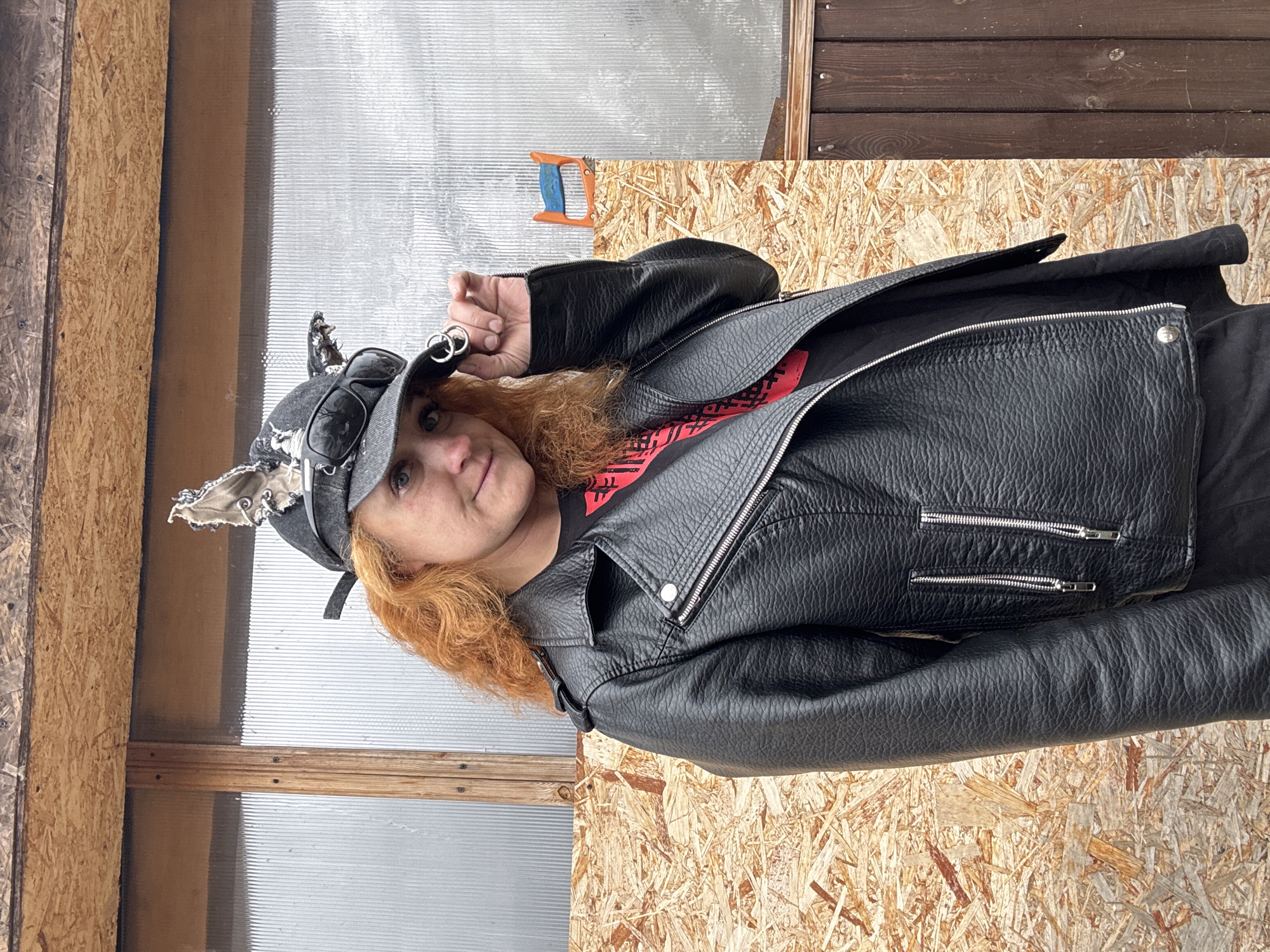 Woman with chainsaw photographed multiple times in Chaikovsky, Russia