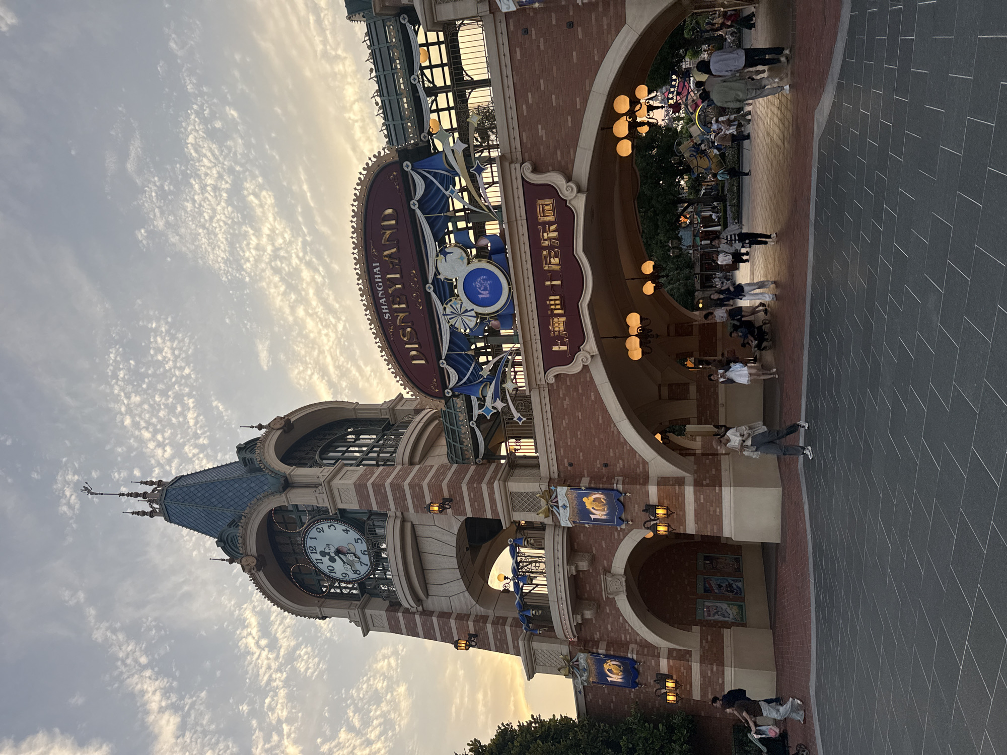 Shanghai Disneyland entrance photographed under cloudy skies