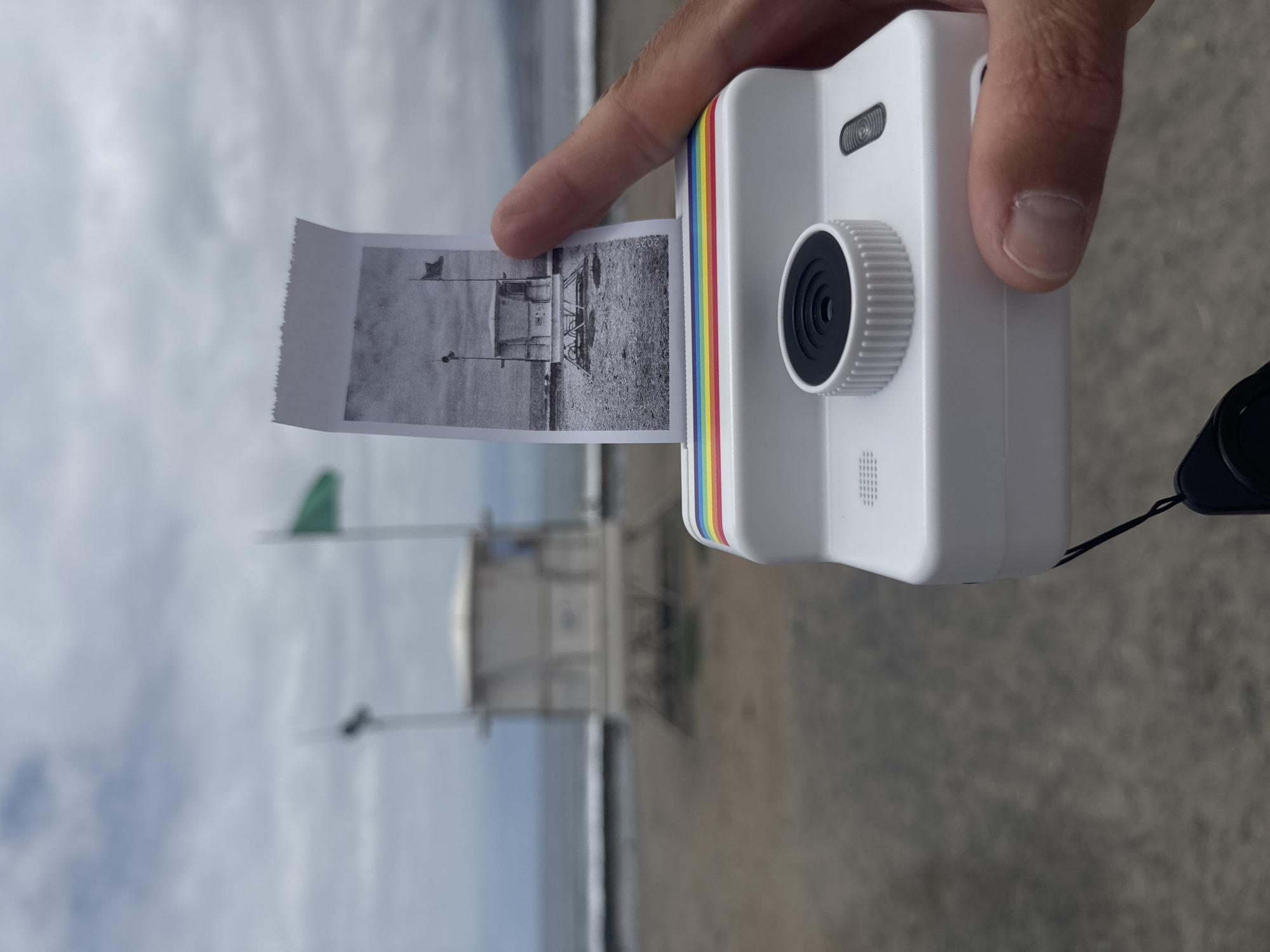 Cameras out on a Tenerife beach, Polaroid and digital