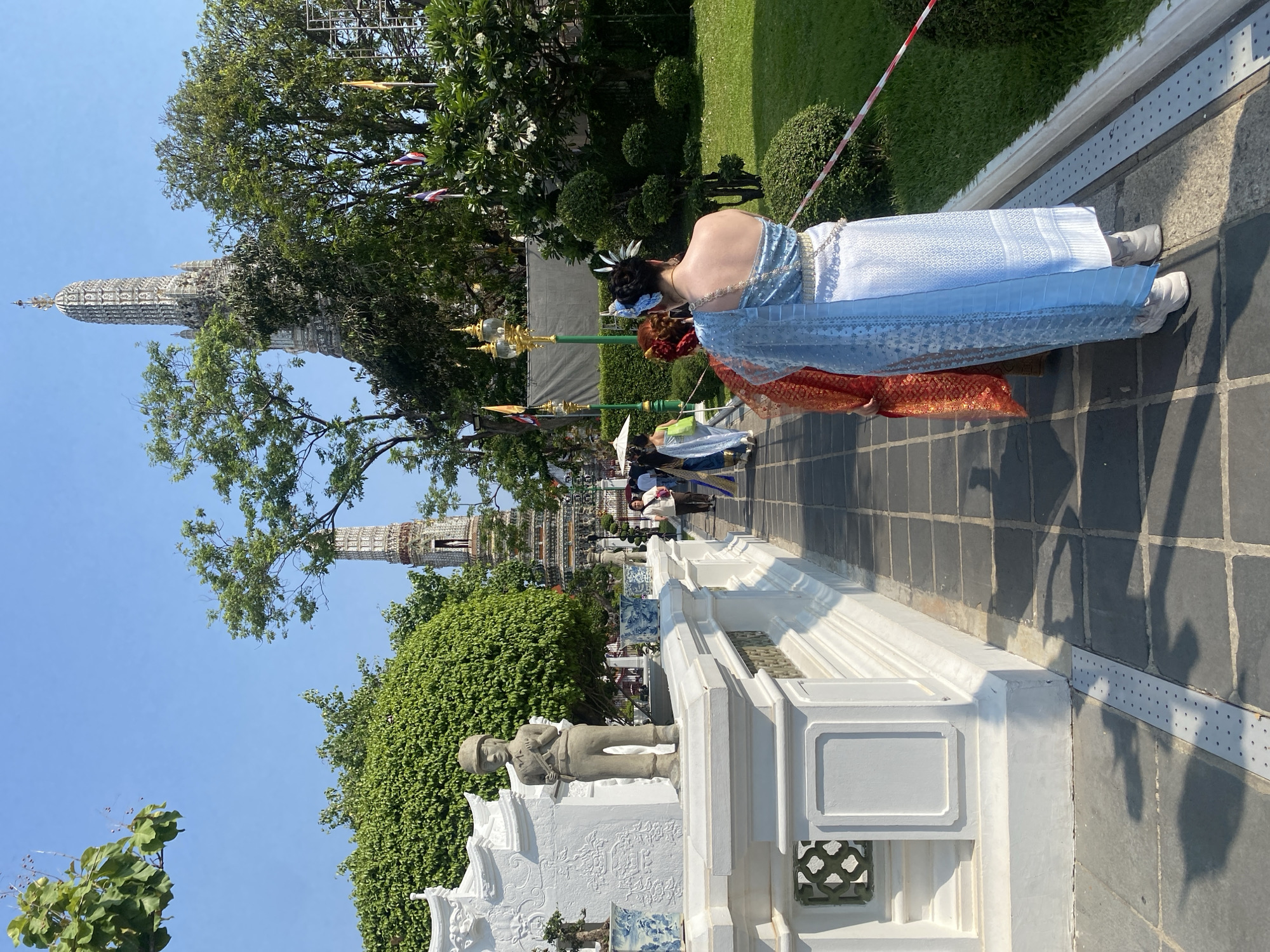 Traditional dress, temple visits documented at Bangkok's Wat Arun