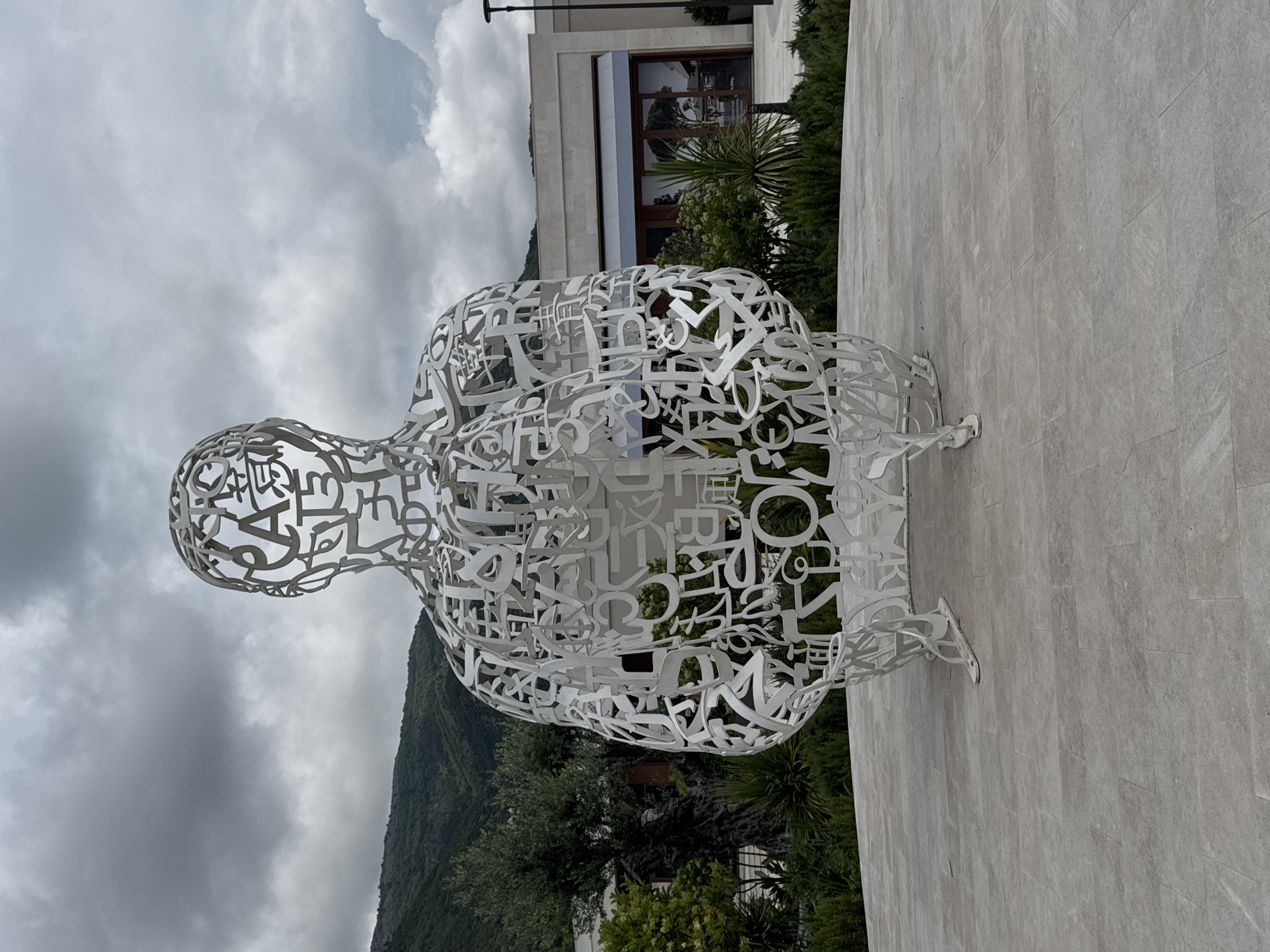 Woman photographs herself around Tivat, Montenegro attractions