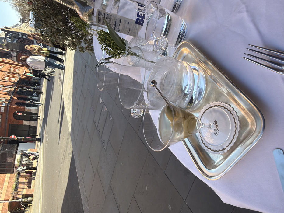 Outdoor dining table spotted on Duke's Walk sidewalk
