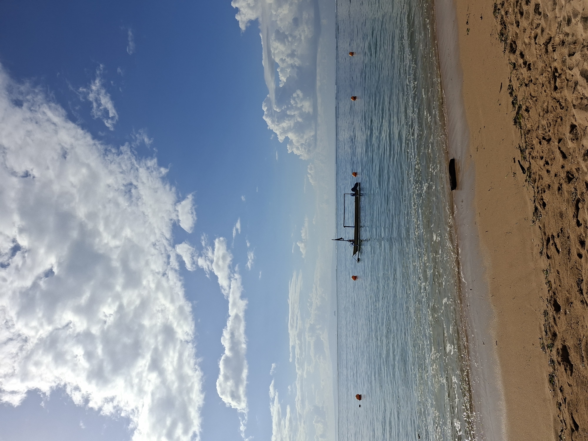 Calm beach scene documented in Denpasar, Indonesia