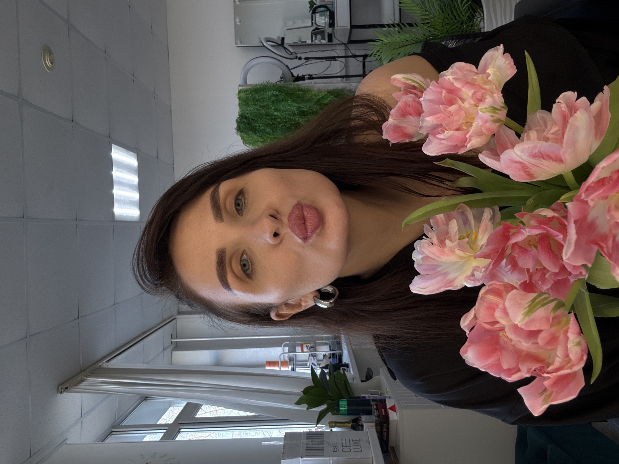 Hair salon visit with pink styling and flowers in Chaikovsky