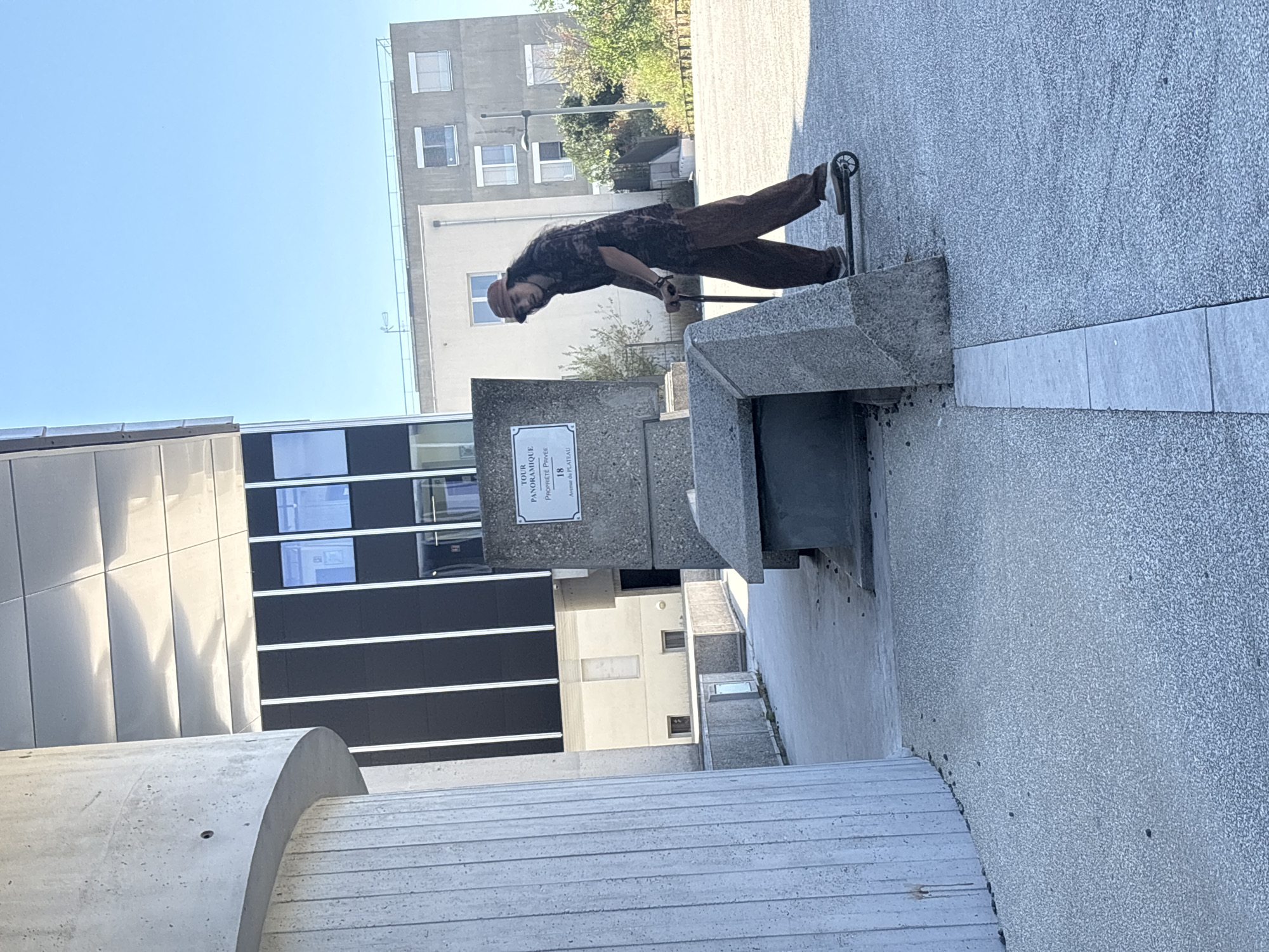 Parkour and scooter tricks among Lyon's brutalist concrete blocks