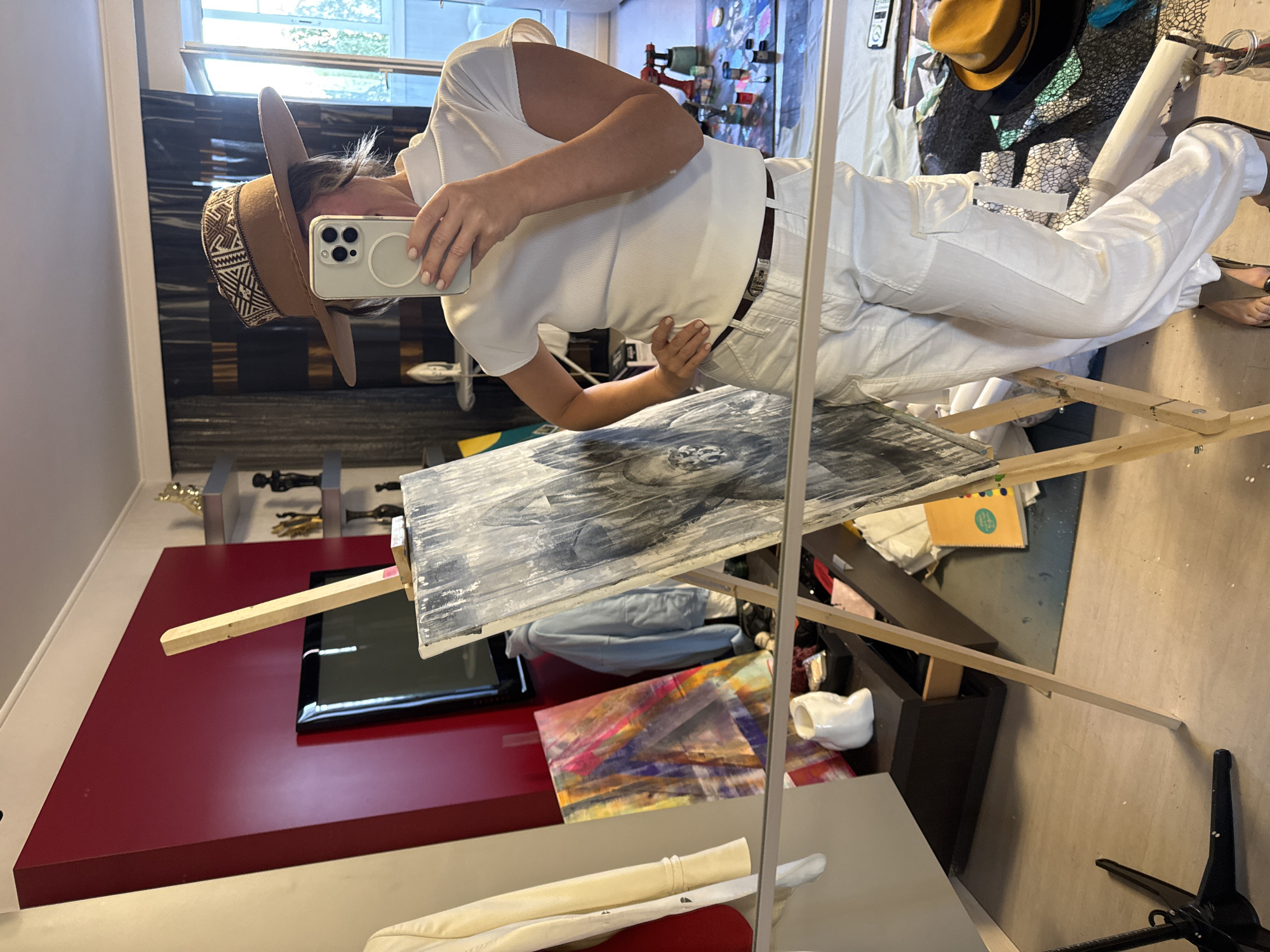 Artist's studio in Moscow: lotus painting and mirror reflection