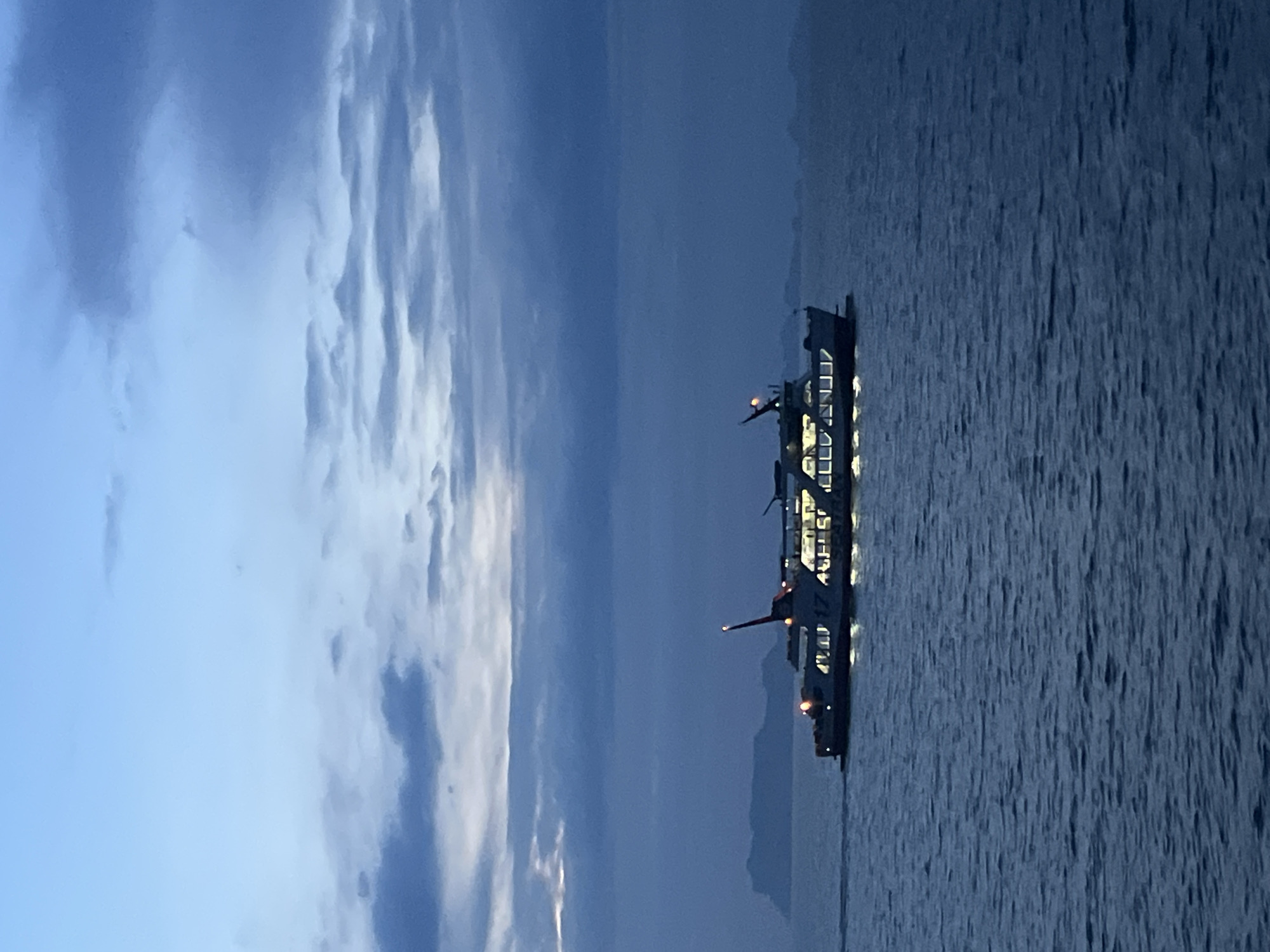 Ferry crossing Gulf of Thailand waters at dusk