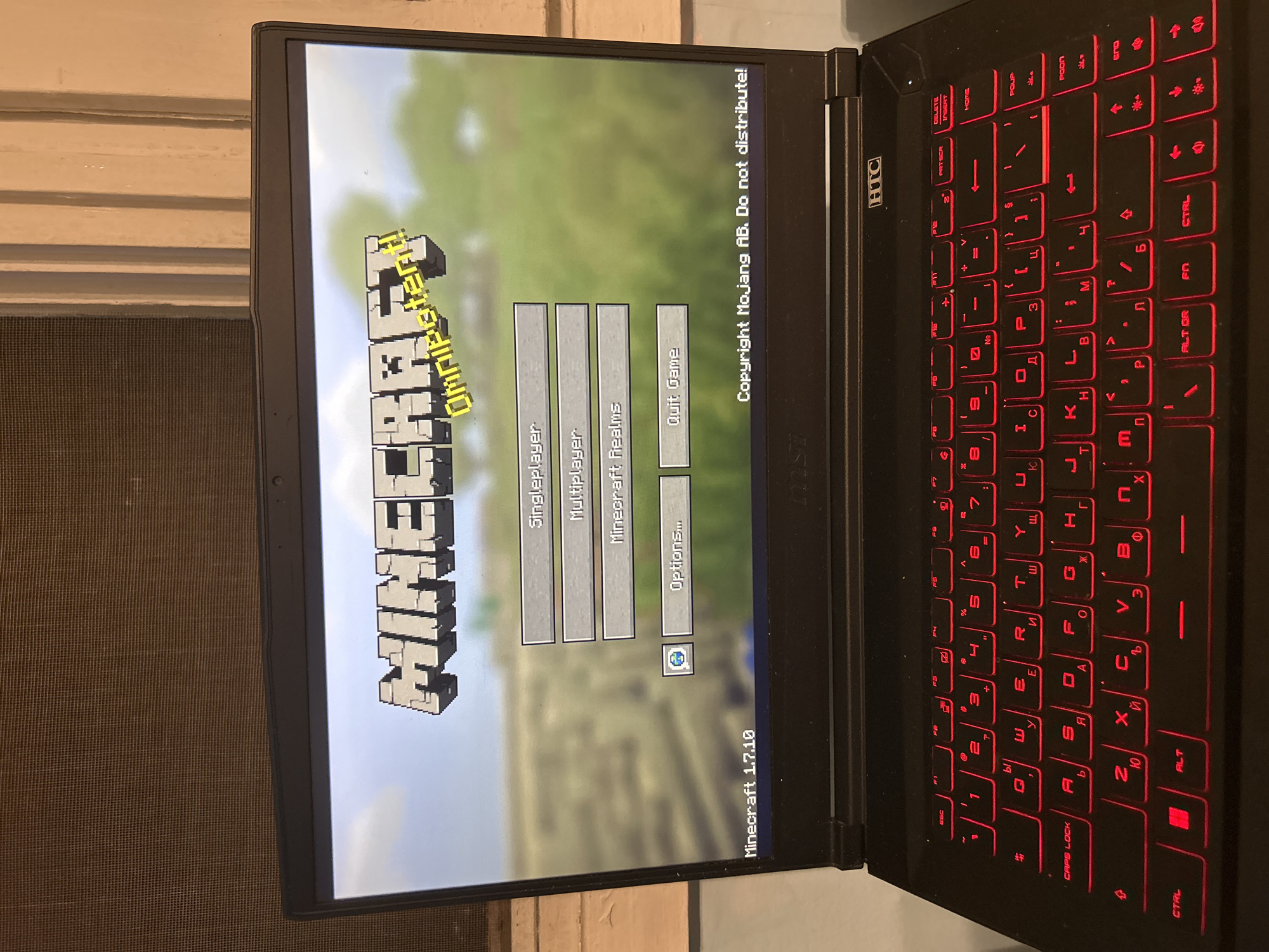 Someone preparing to play Minecraft 1.7.10 on laptop setup