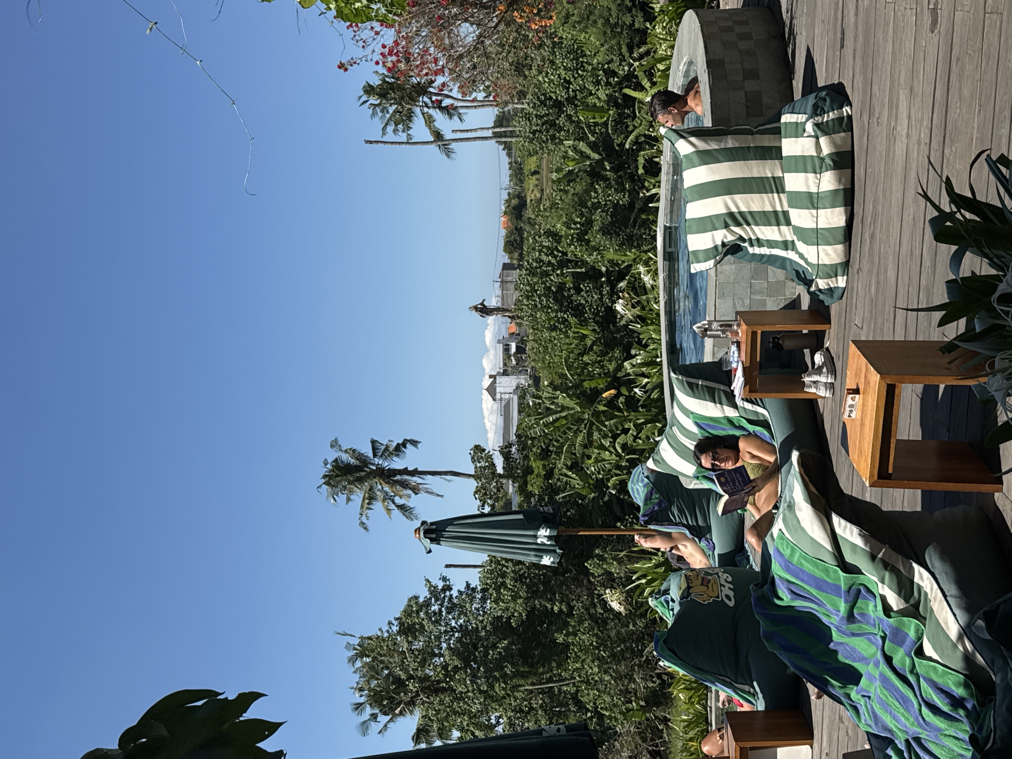 Resort guests enjoy morning pool activities in Mengwi