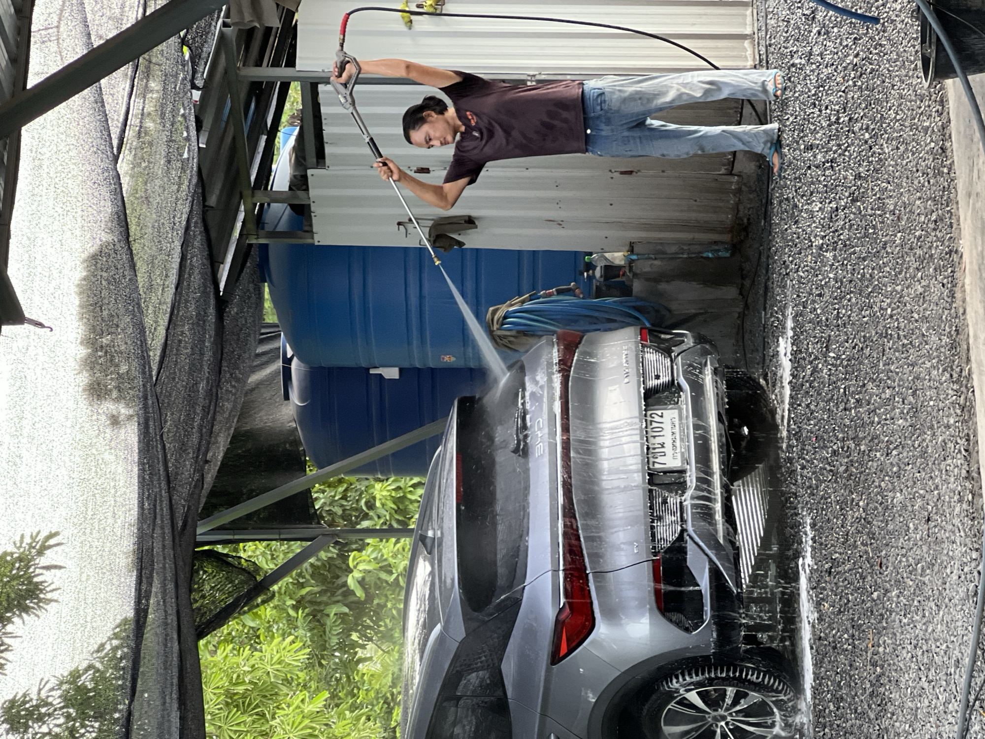 Full-service car wash in action at Ban Bang Rak, Samui