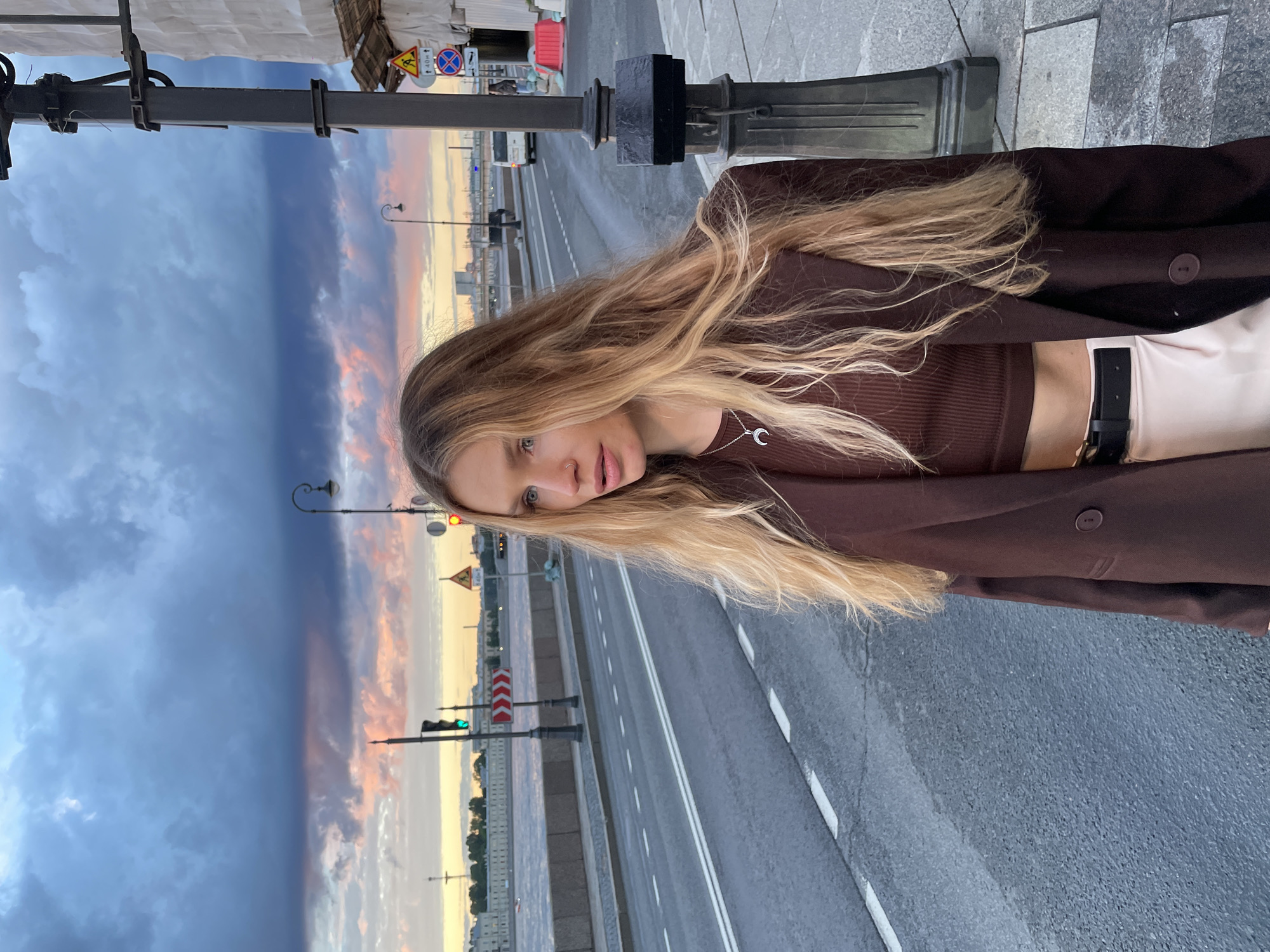 Sunset stroll along a waterfront promenade