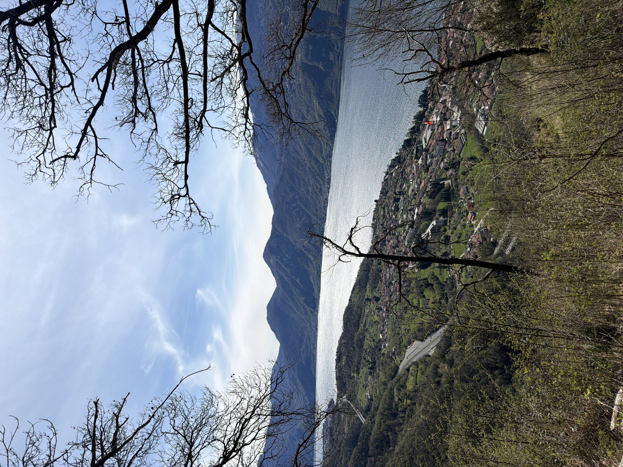 Tourists enjoy scenic Lake Como views in Lierna, Italy