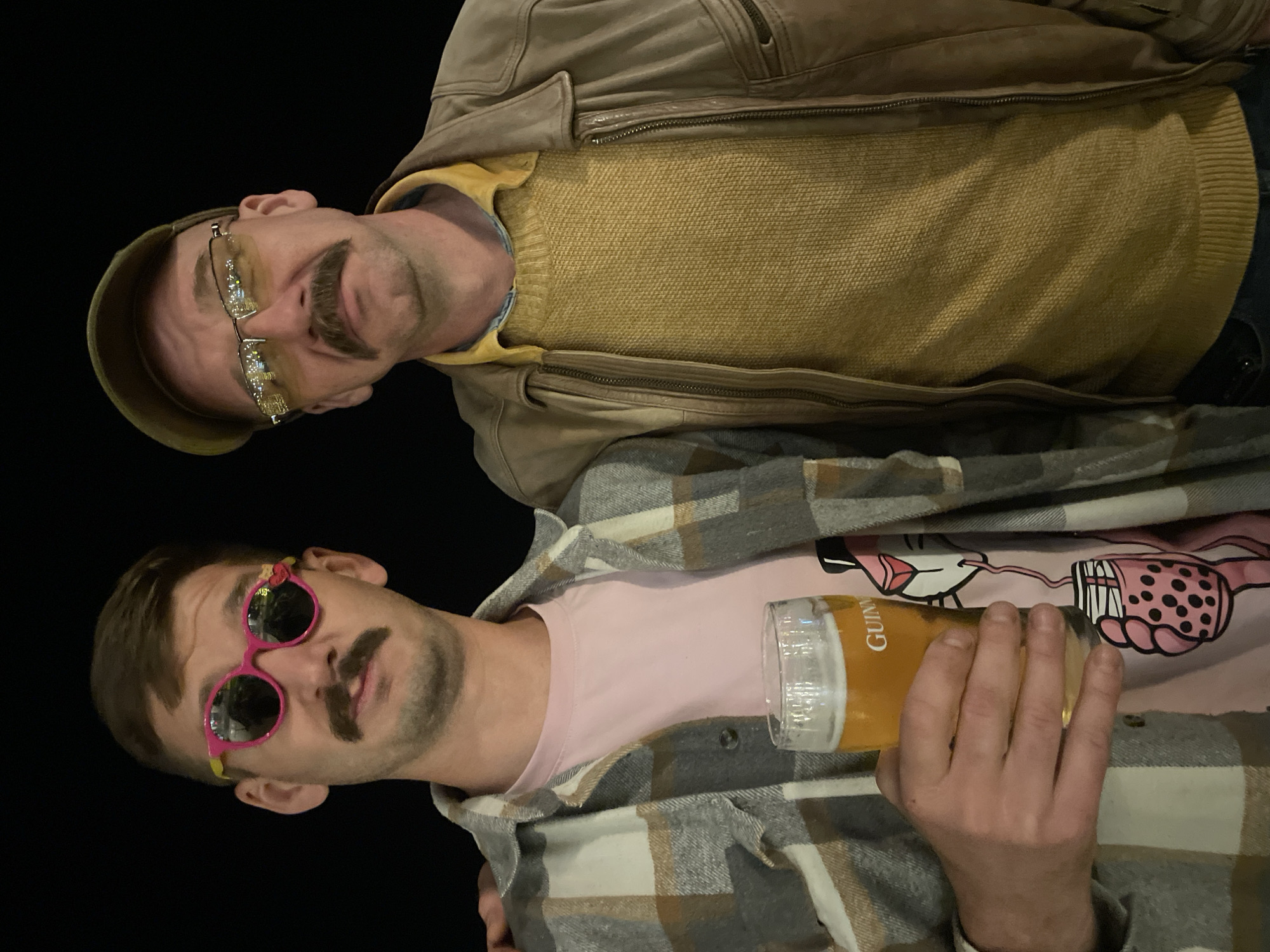 Two friends pose for photos during evening in Rafailovići