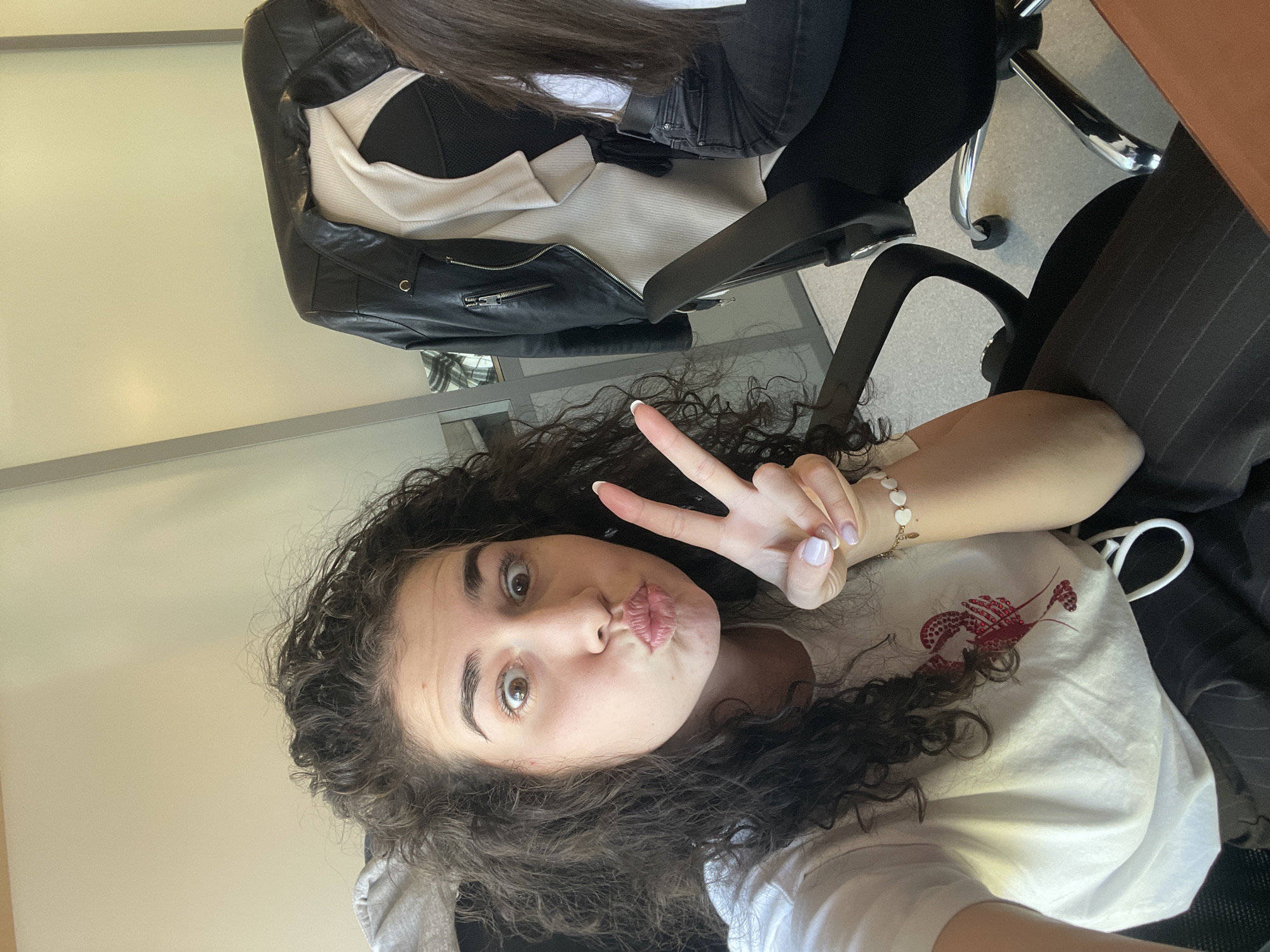Woman documents office workday through selfies in Sofia