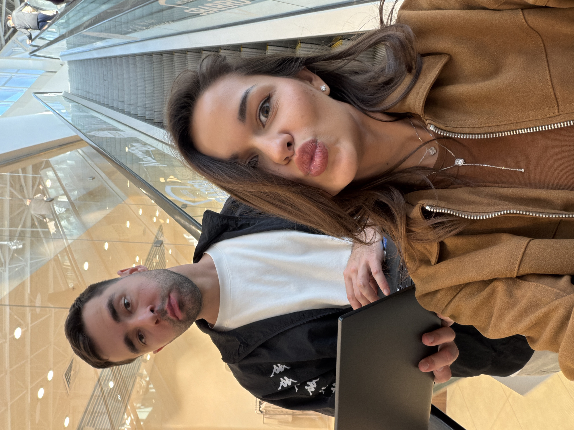 Casual selfies documented in Krasnoyarsk public spaces