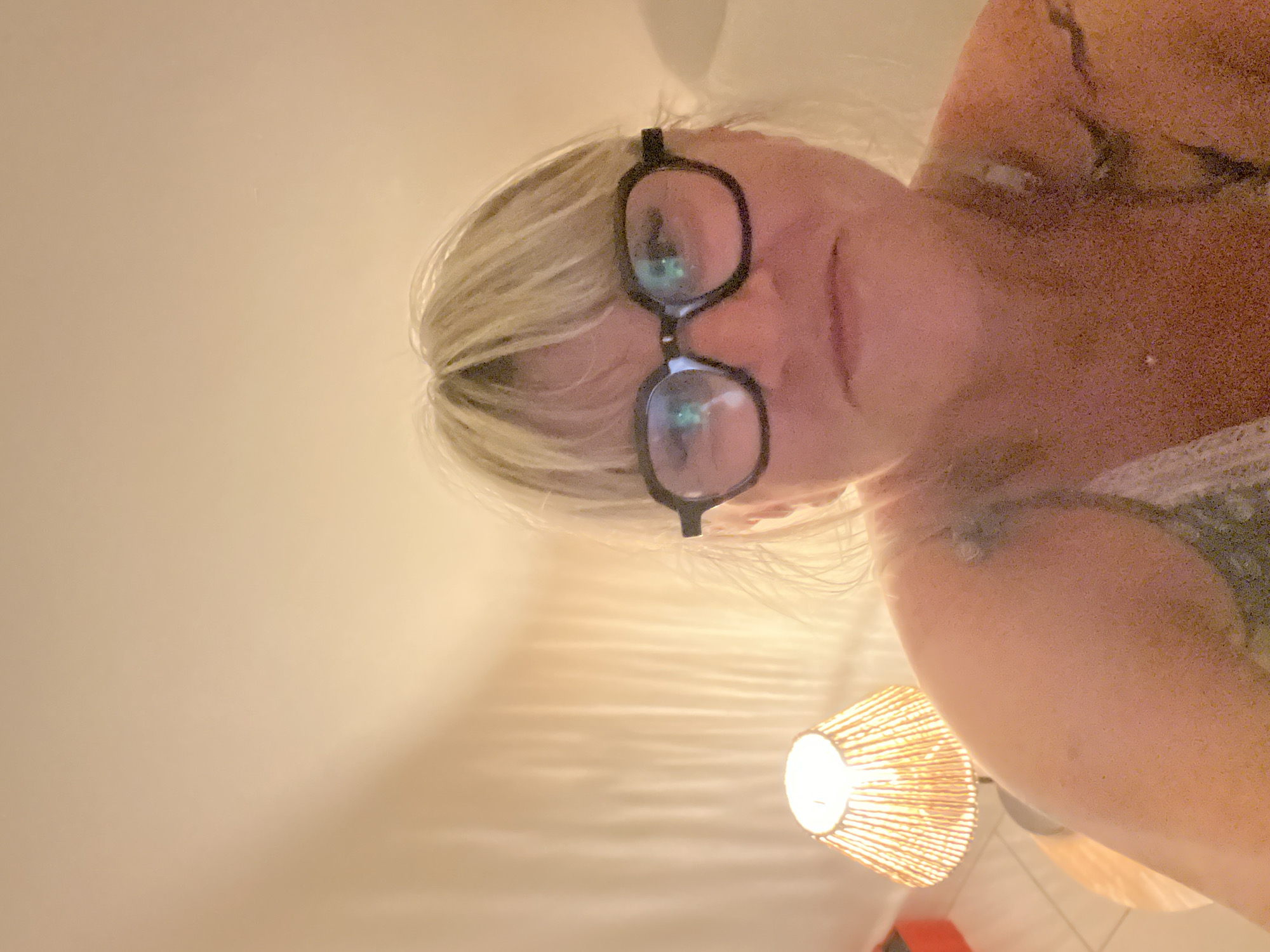 Casual selfie moment in a Cannes interior, evening