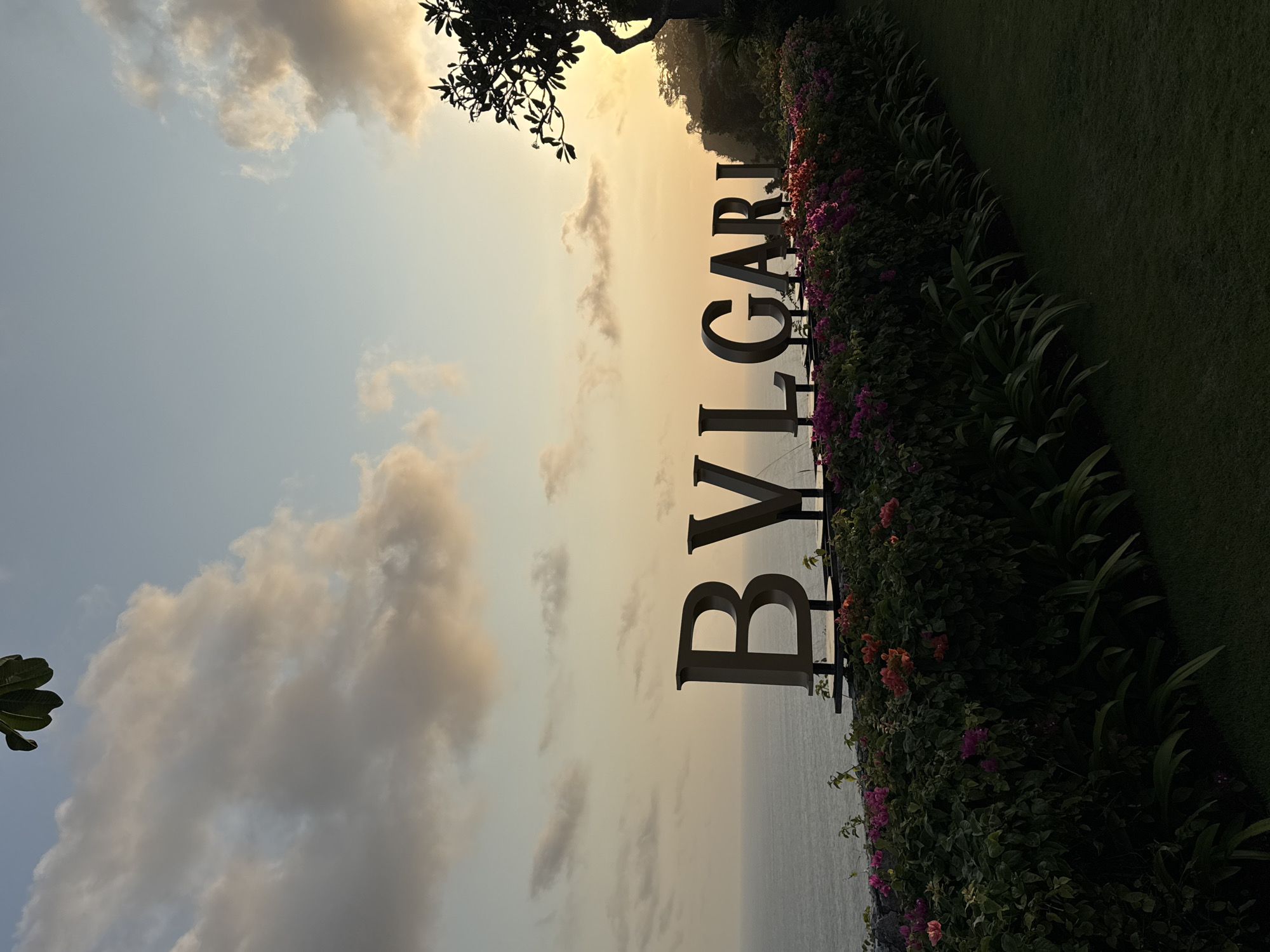 Bulgari Resort Bali at sunset, hillside bungalows and ocean views