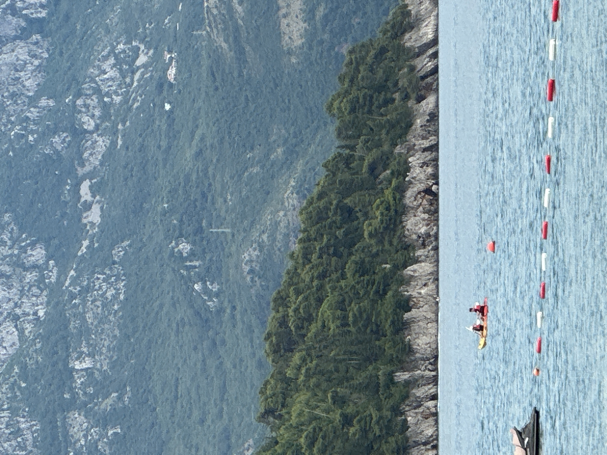 Summer afternoon parasailing and beach activities in Budva, Montenegro