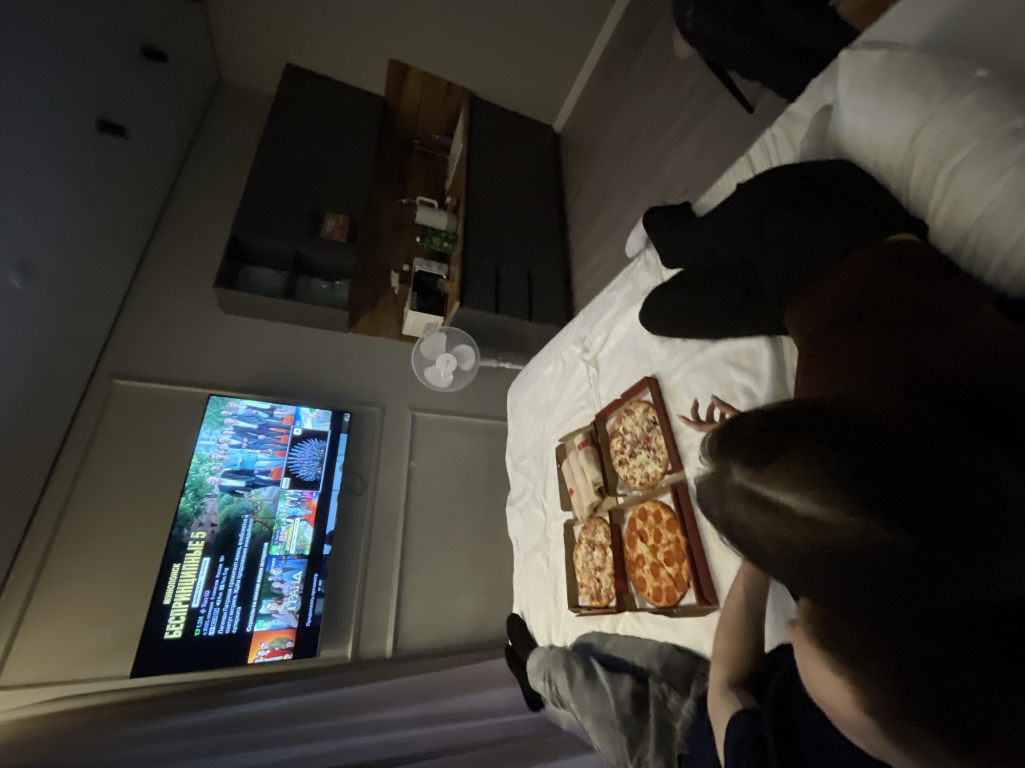 Hotel guests enjoy casual takeout dinner in Ufa room