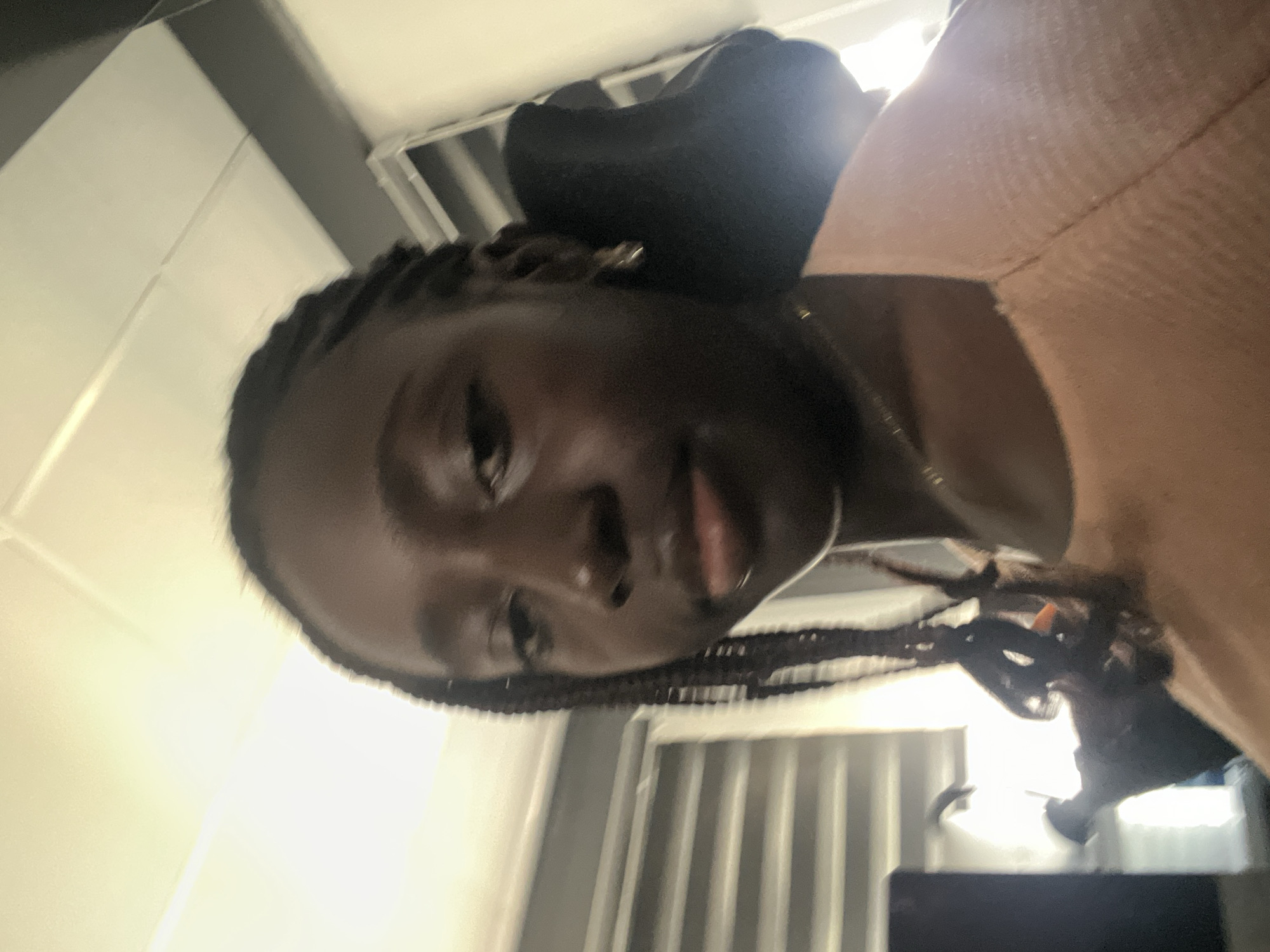 Woman takes multiple selfies in Karum, Nigeria