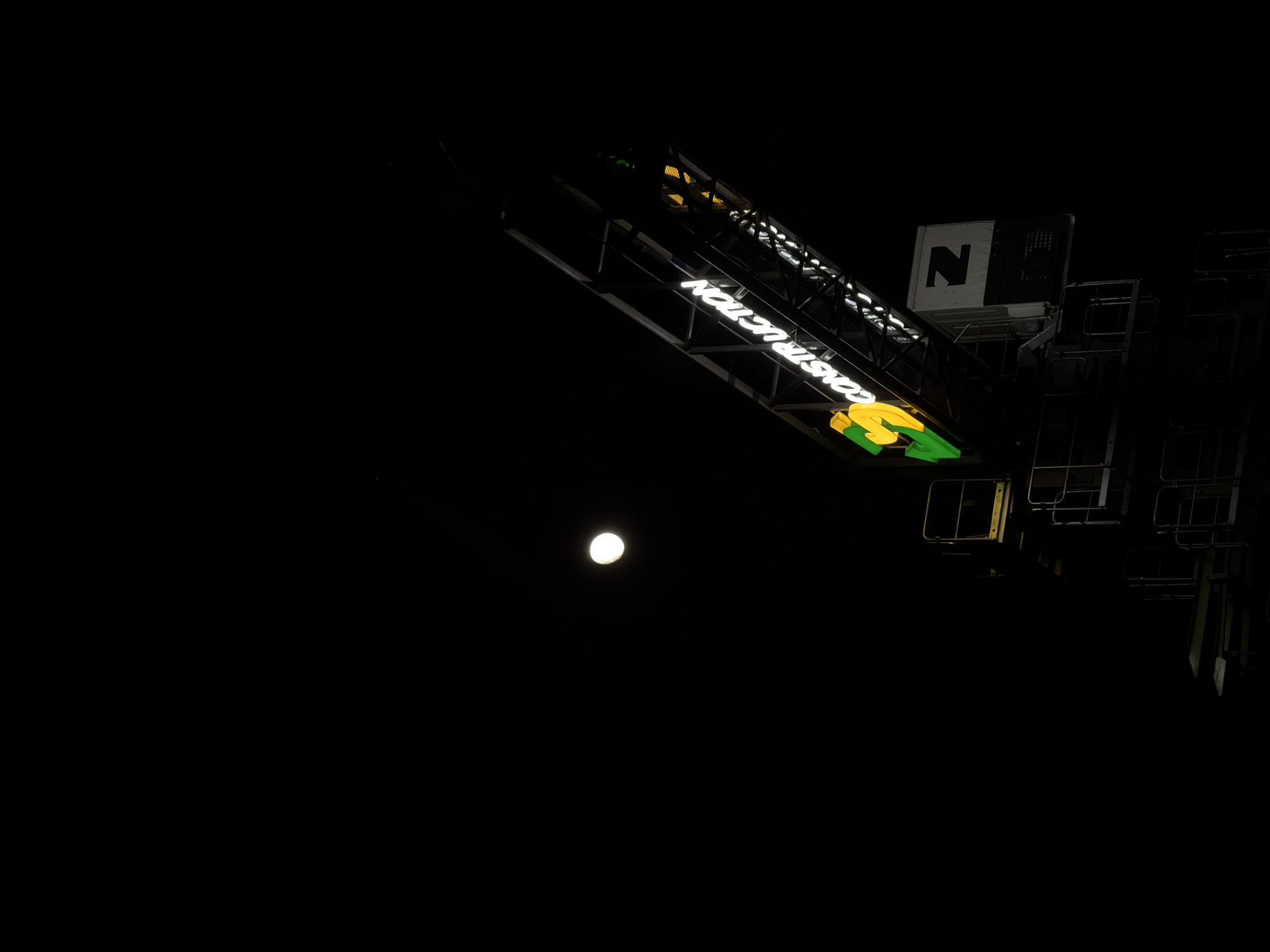 Full moon illuminates Yerevan construction site at night