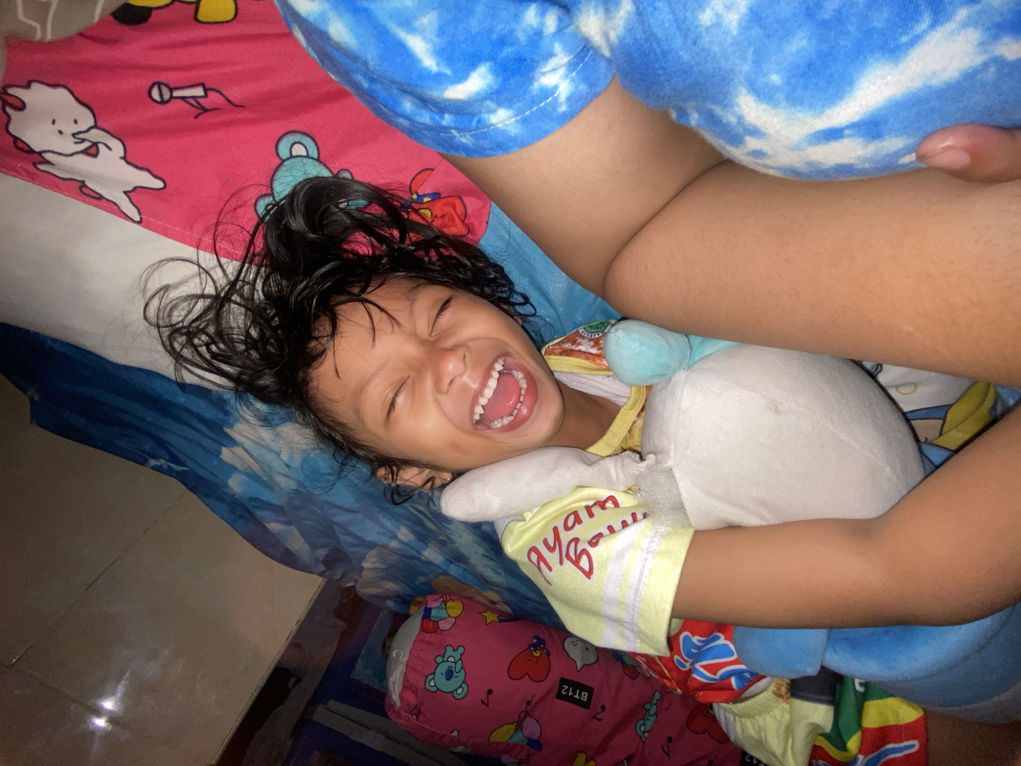 Child's joyful moments captured in Gelam, Indonesia
