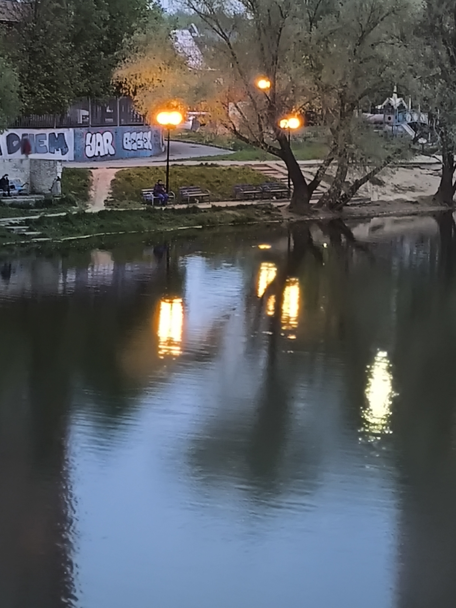 Evening pond scenes documented in Khimki, Russia