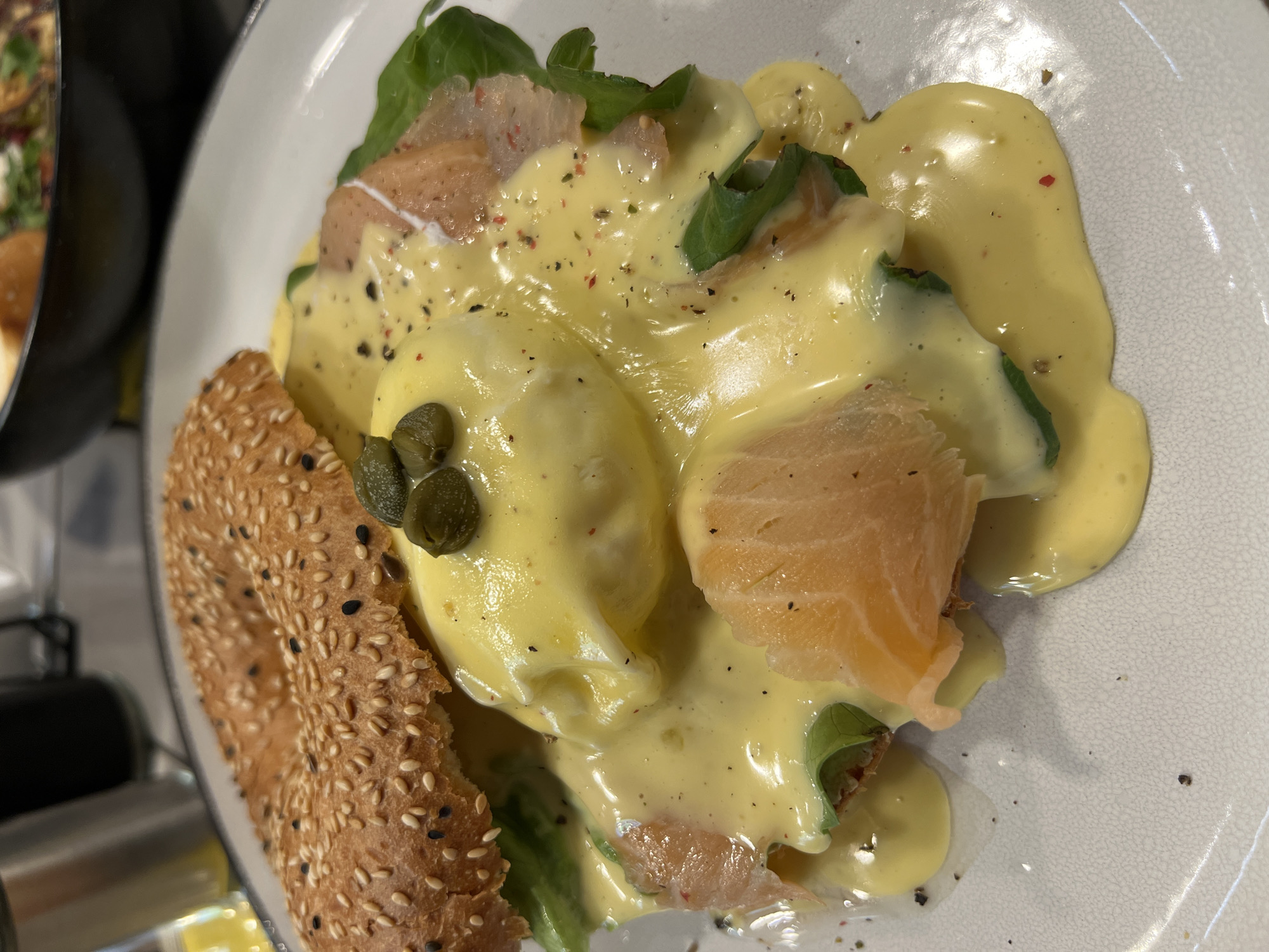 Salmon Eggs Benedict photographed at Tbilisi breakfast spot