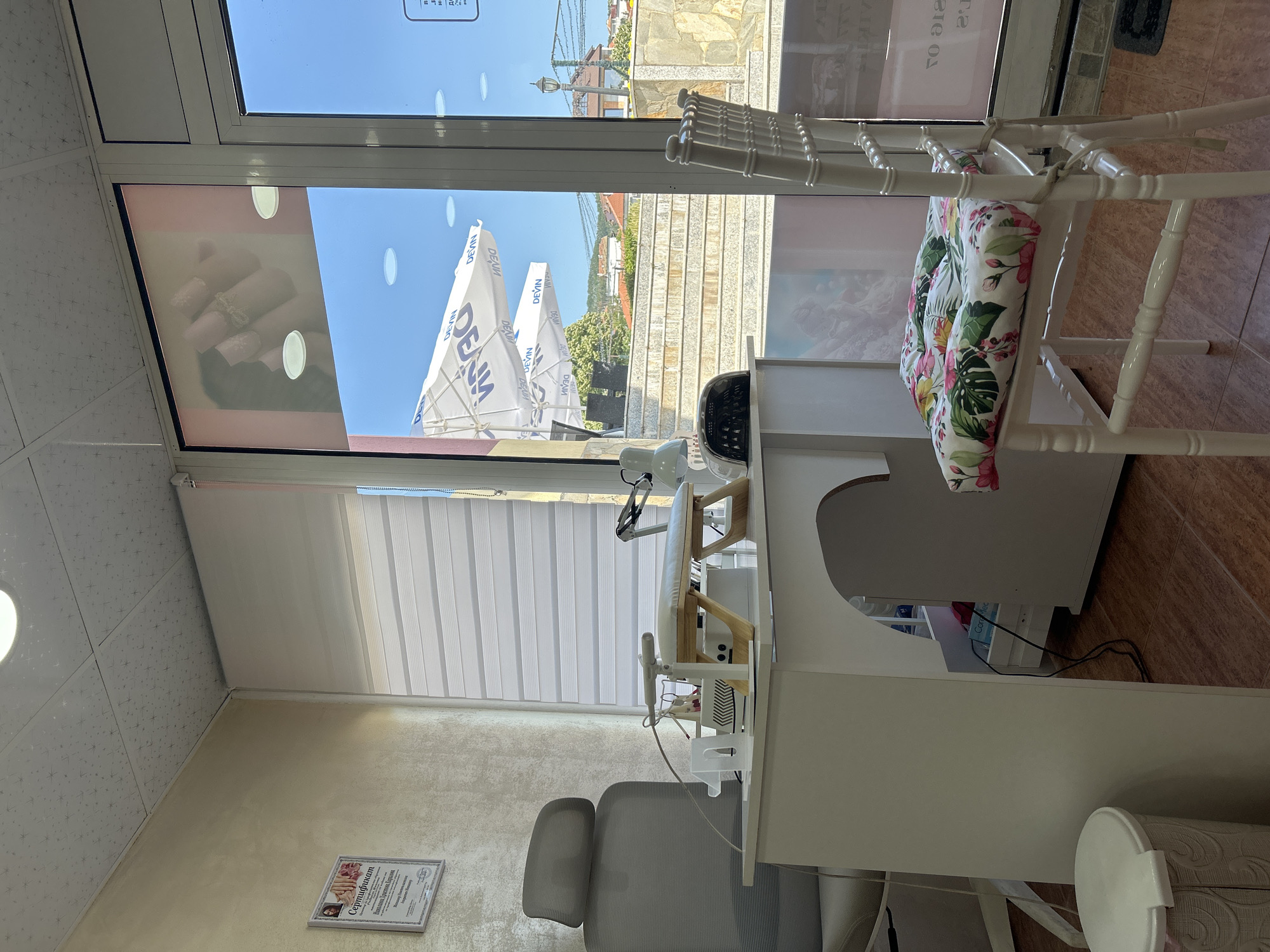 Inside and outside a nail salon in Aksakovo, Bulgaria