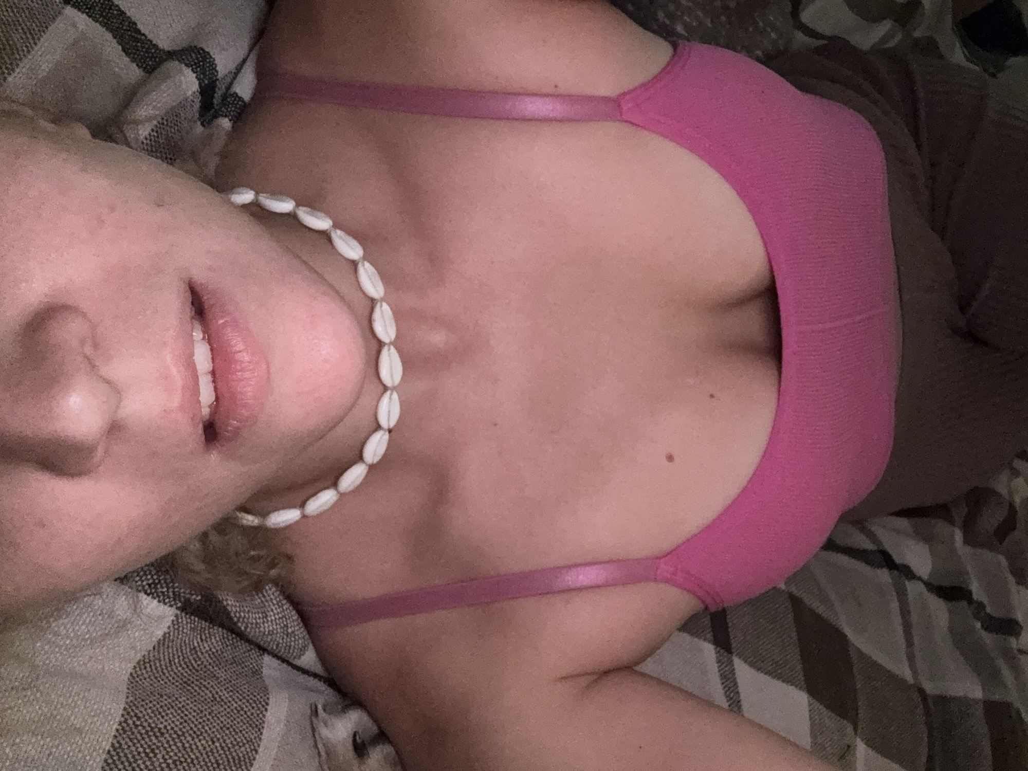 Woman documents personal moments with shell necklace in Minsk