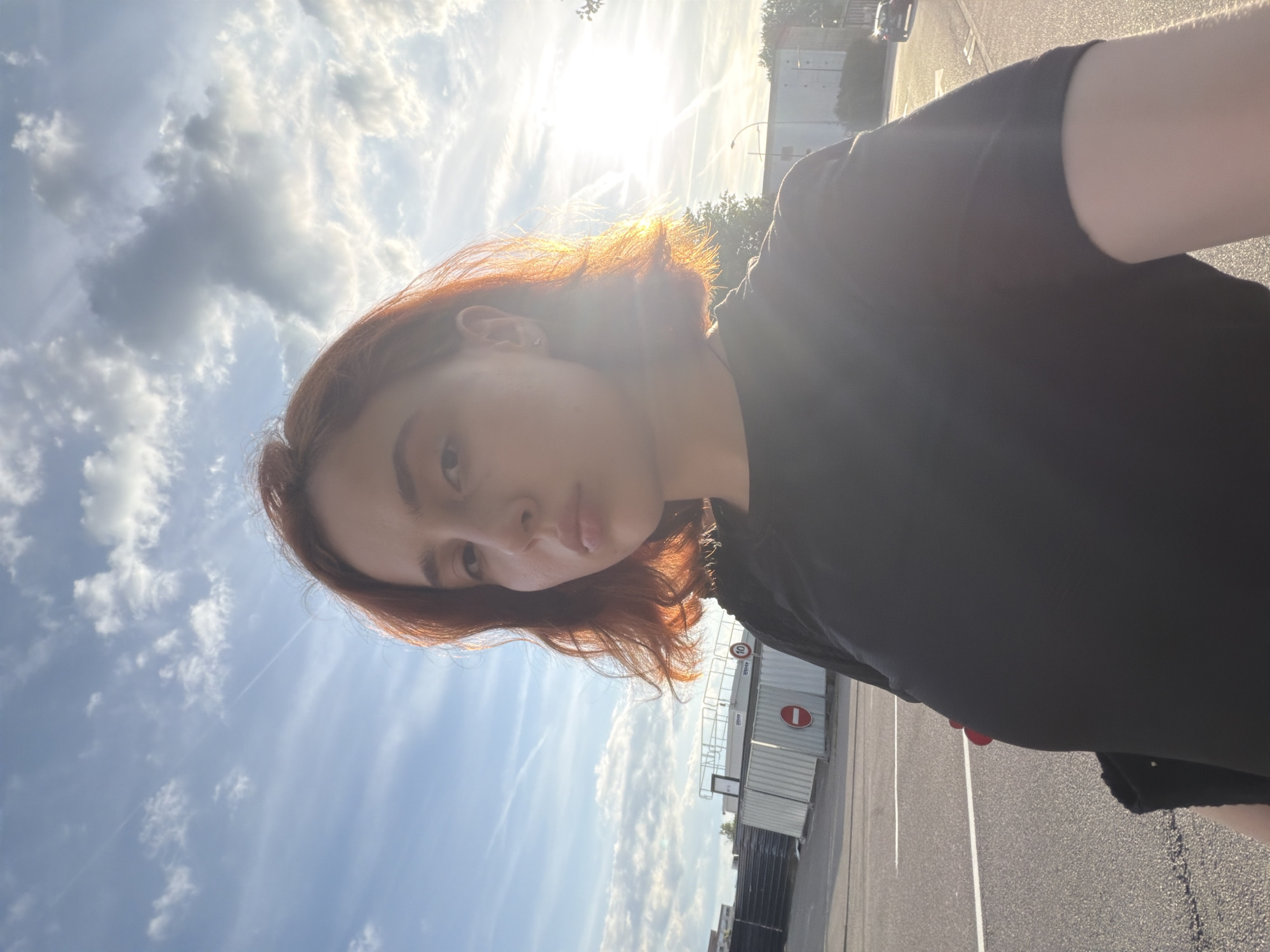 Young woman takes creative selfies in sunny Strasbourg