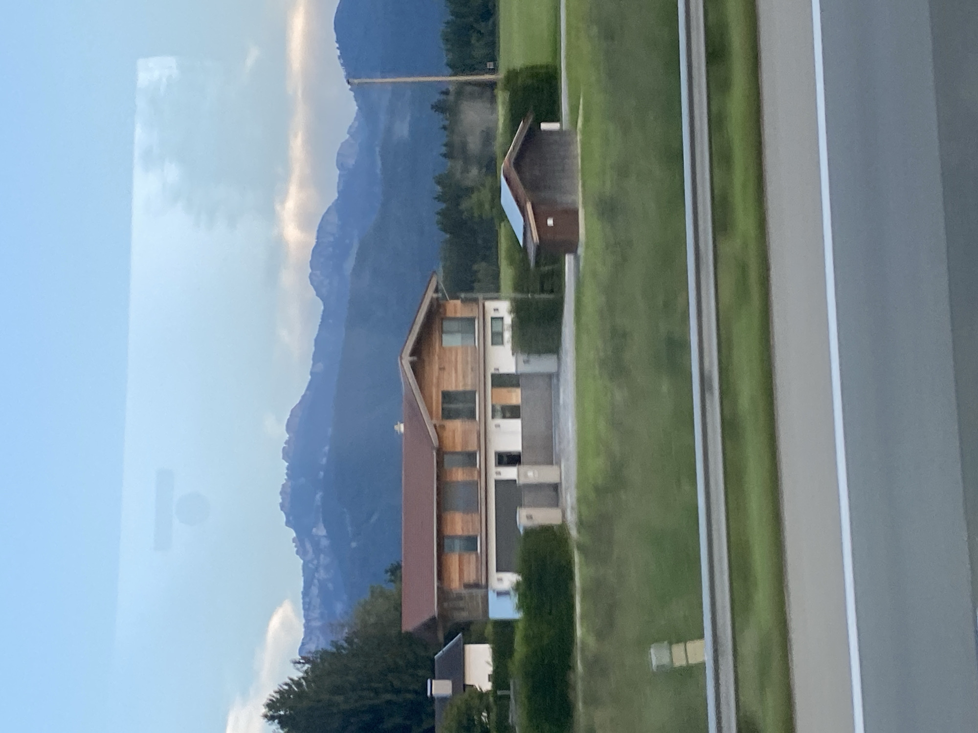Rolling past a wooden farmhouse in rural Bavaria