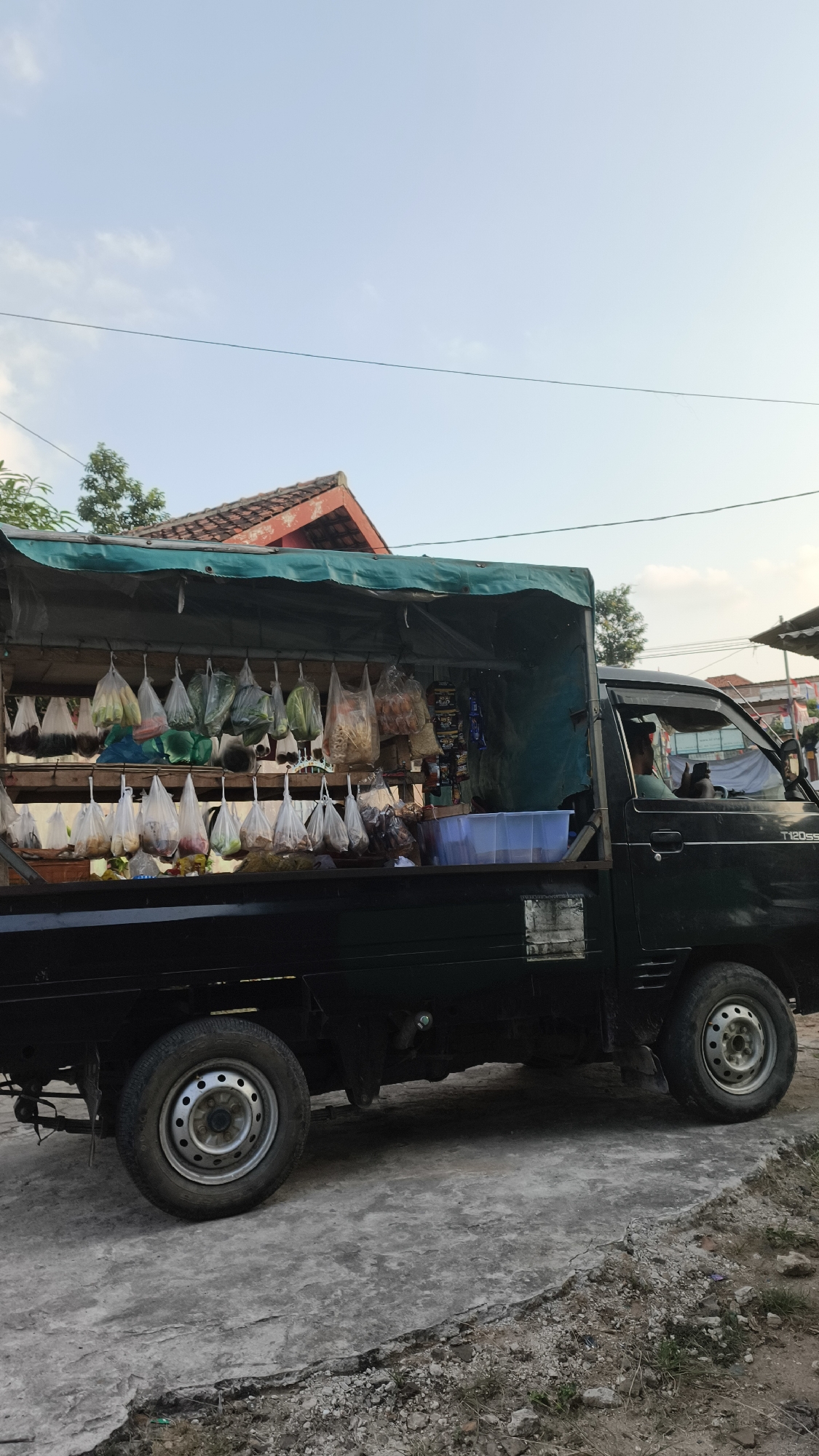 Mobile produce truck sets up shop on a Bandar Lampung street