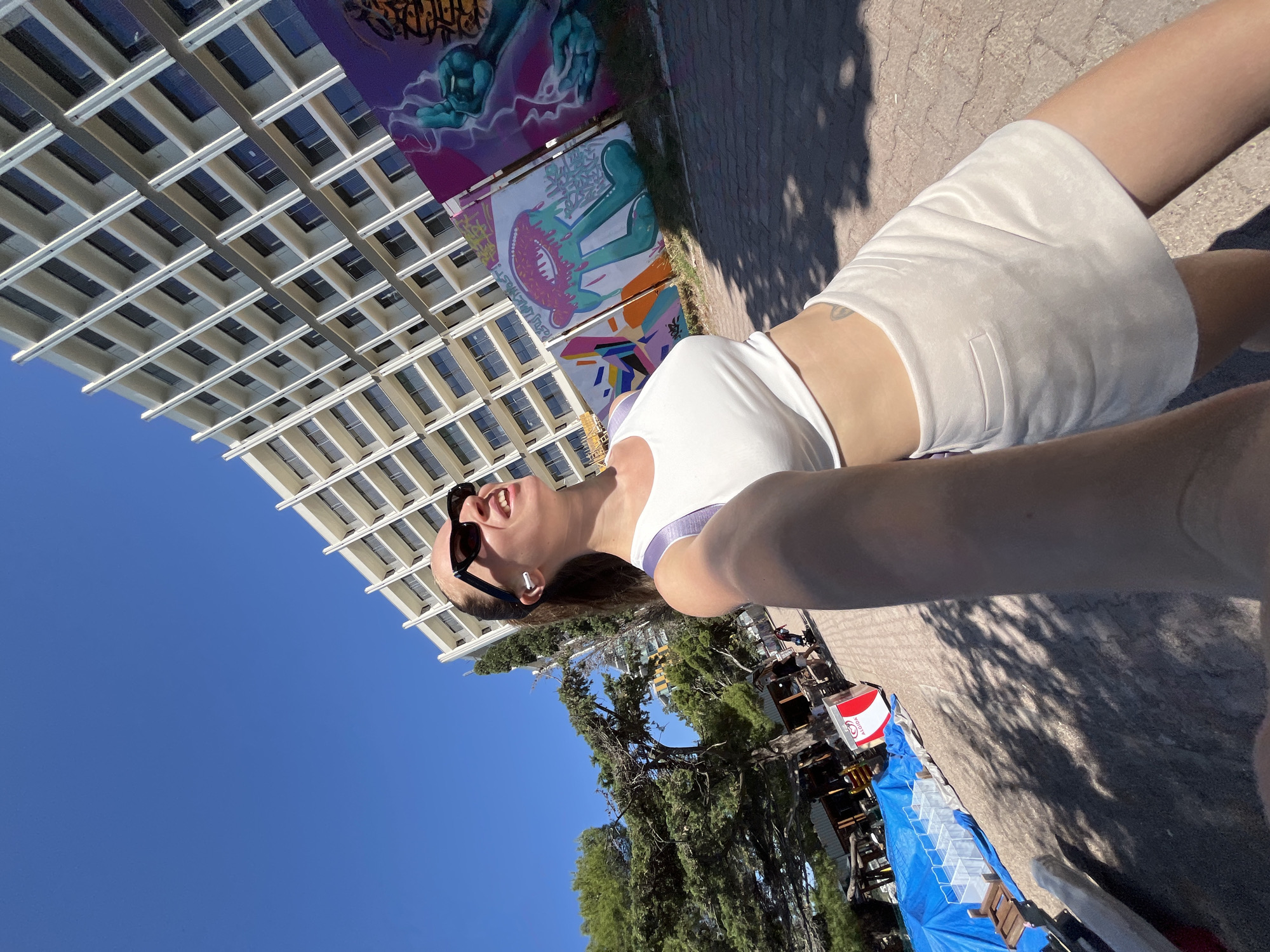 Woman takes upward-angled selfie in Rafailovići, Montenegro
