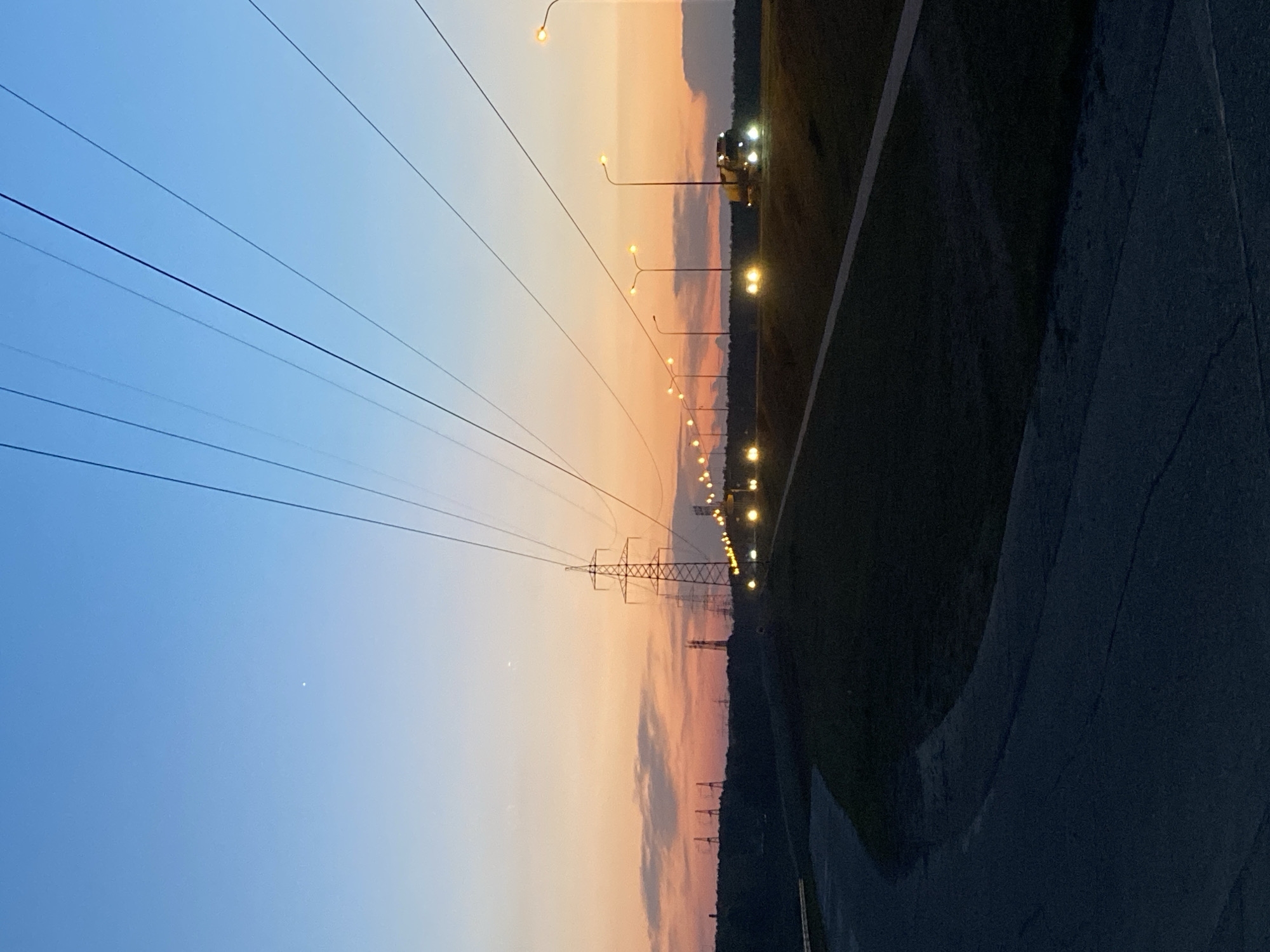 Evening power lines and pathways documented in Chaikovsky
