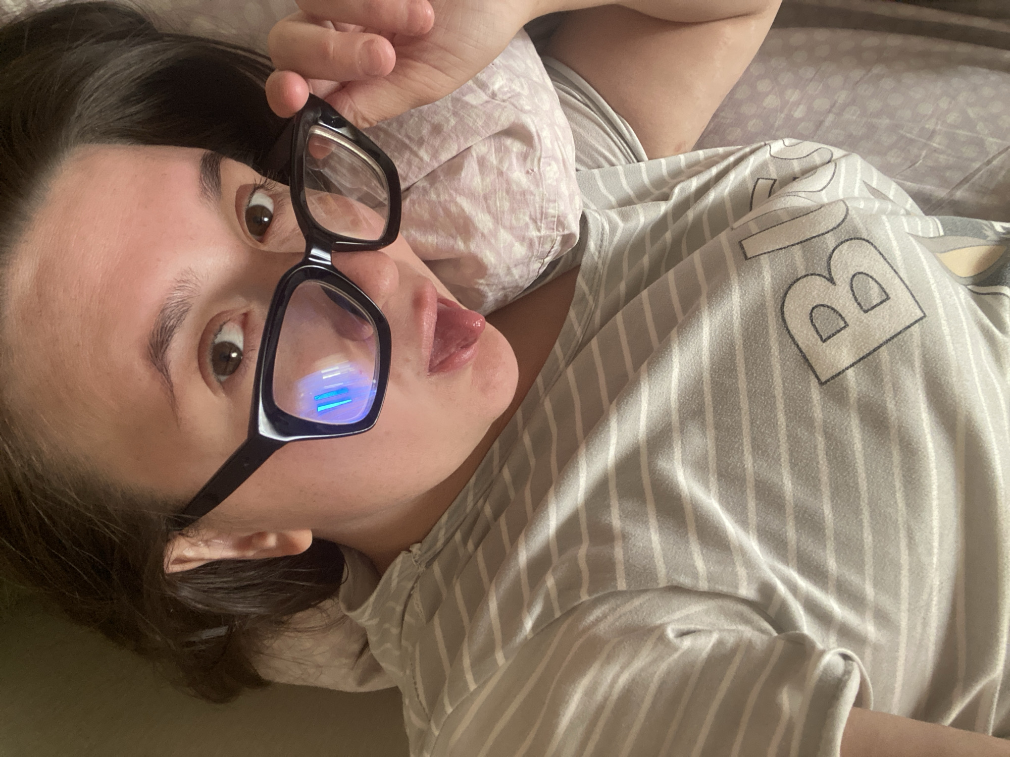 Woman documents quiet morning moments in Russian bedroom