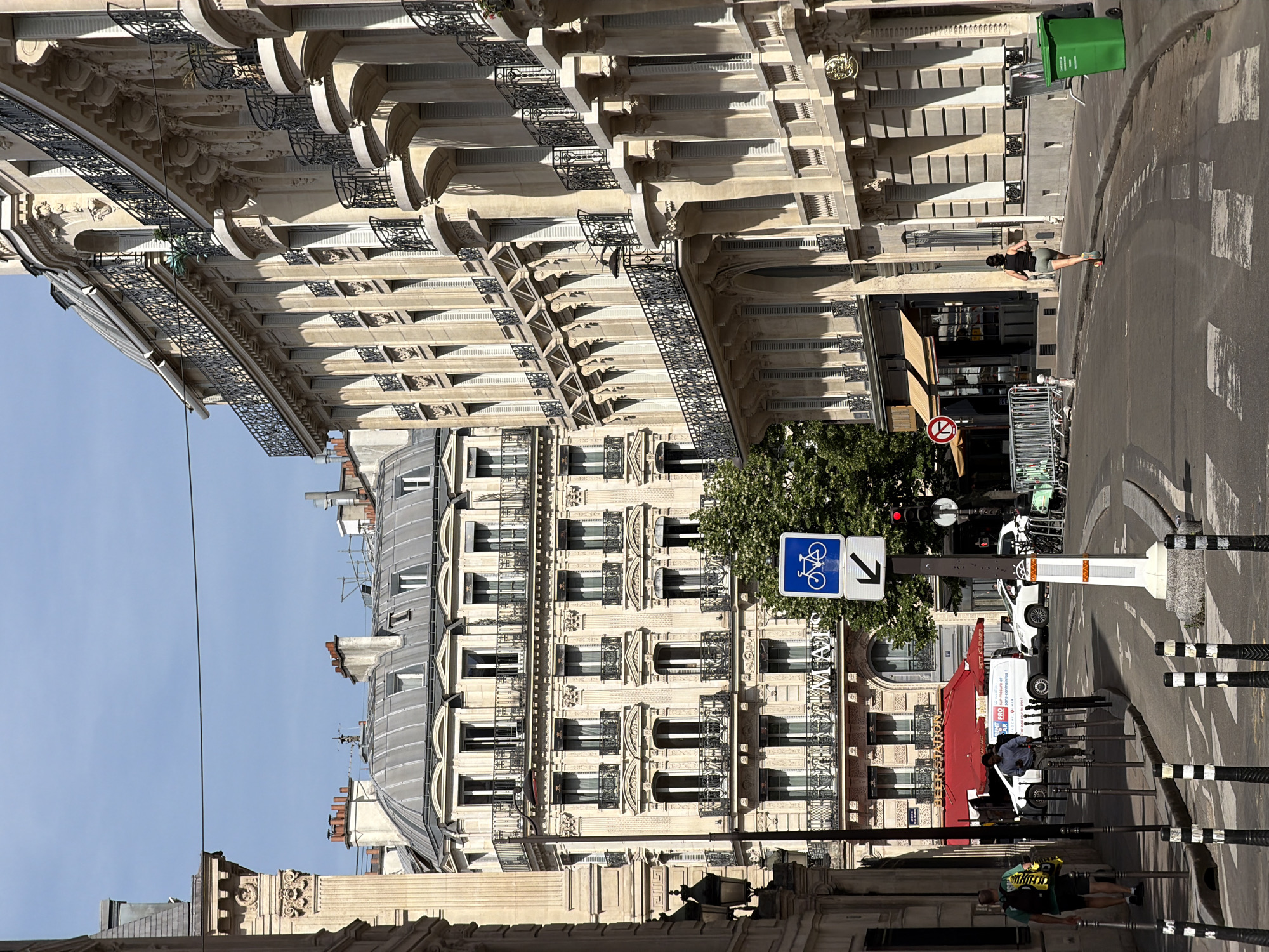 Morning walk through central Paris captures street architecture, café