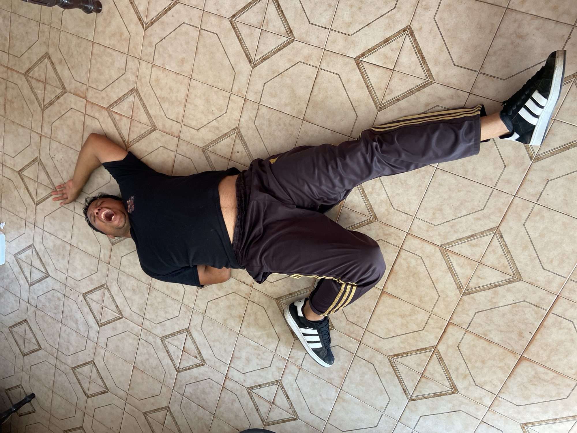 Man observed lying on floor in Tinaquillo, Venezuela