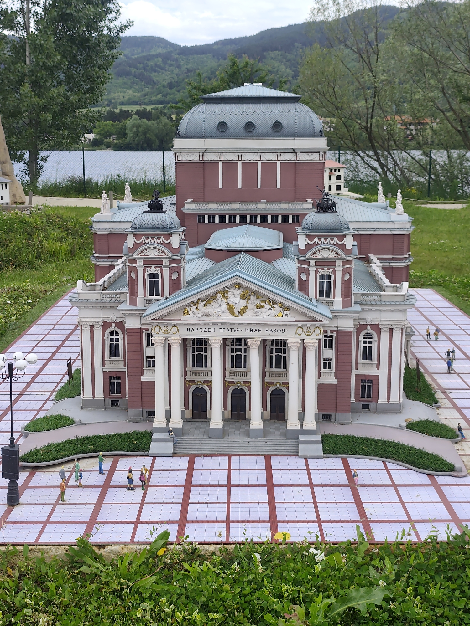 Tourist documents miniature Bulgarian landmarks at Pravets theme park