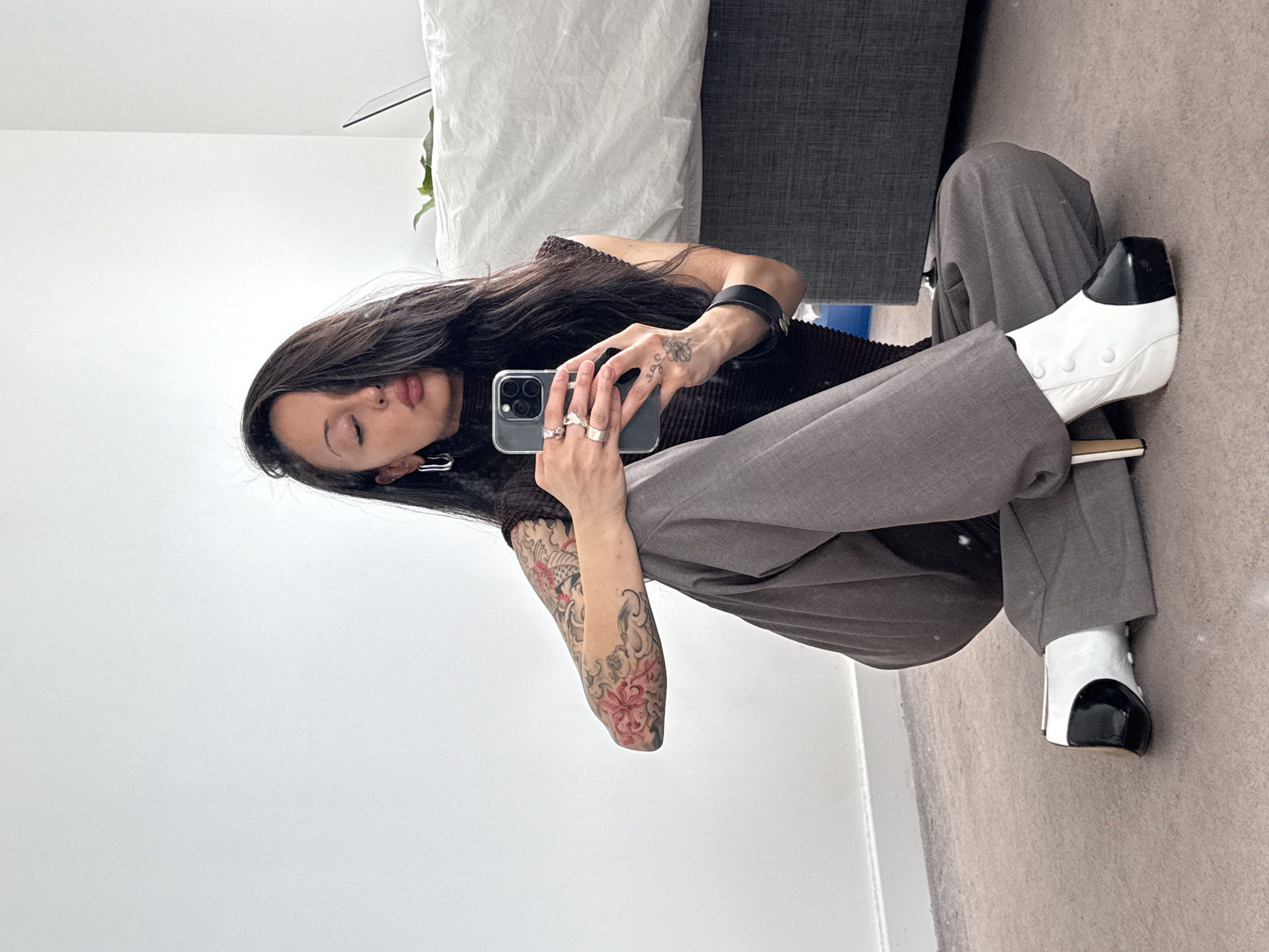 Person takes mirror selfie at London residence