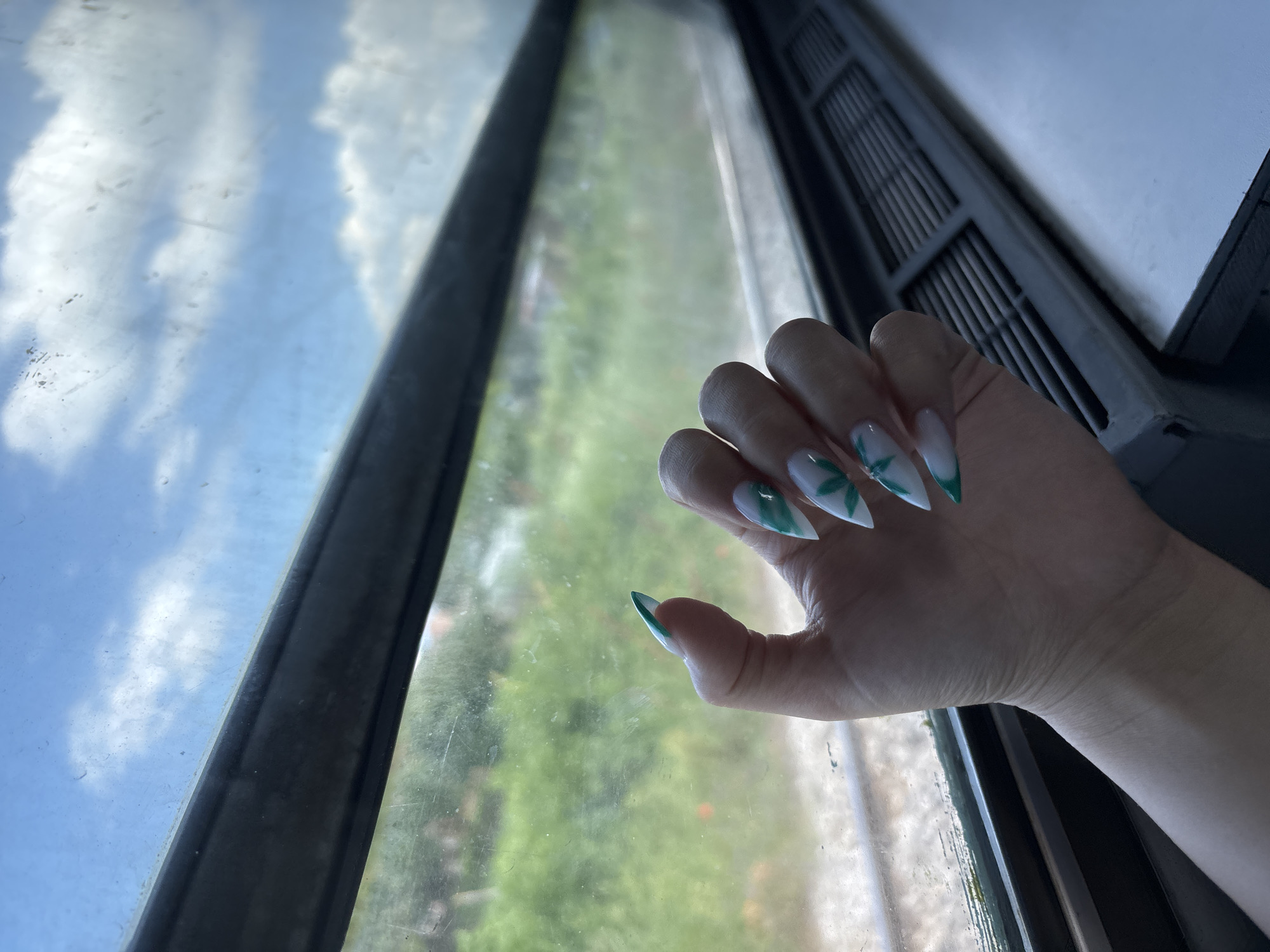 Personal moments captured: nail art display and cold beverage