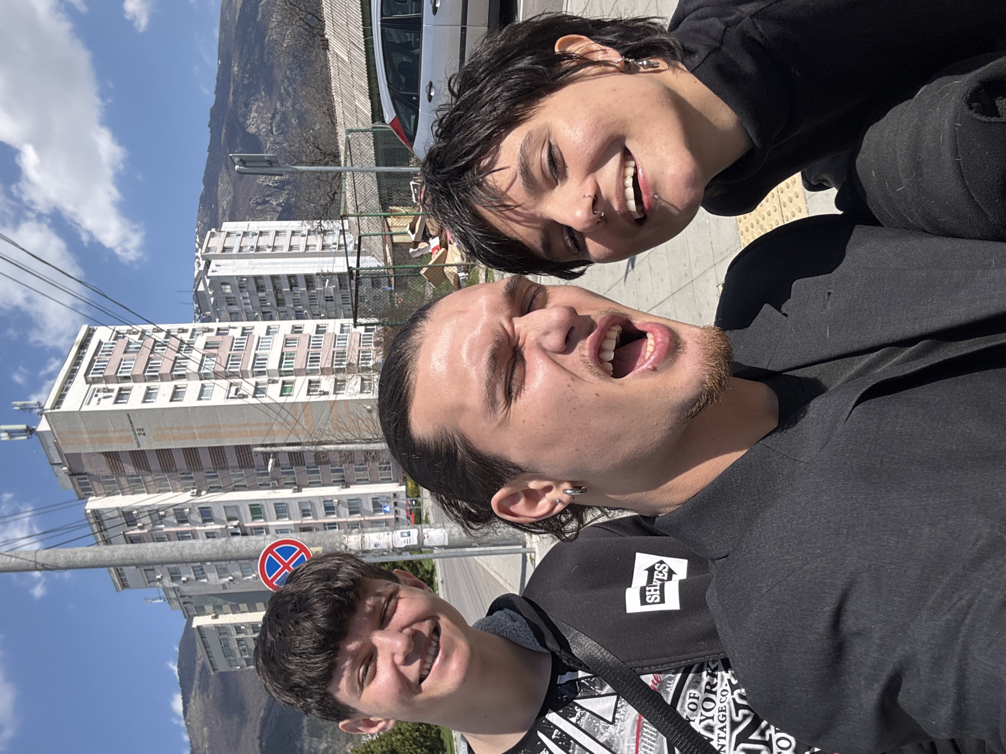 Three people pose for outdoor selfie in Karlovo