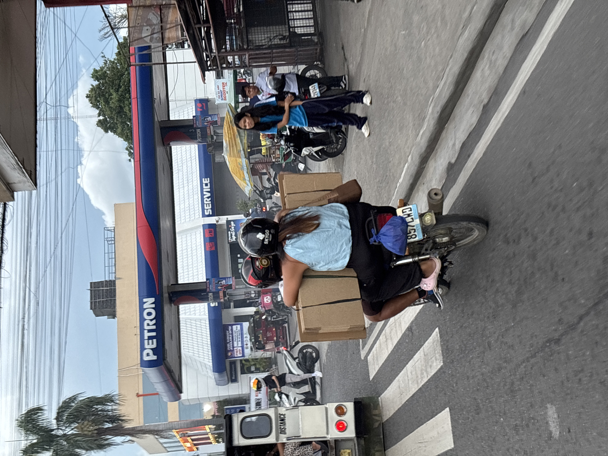 Street vendors, snacks, and traffic on a Davao morning